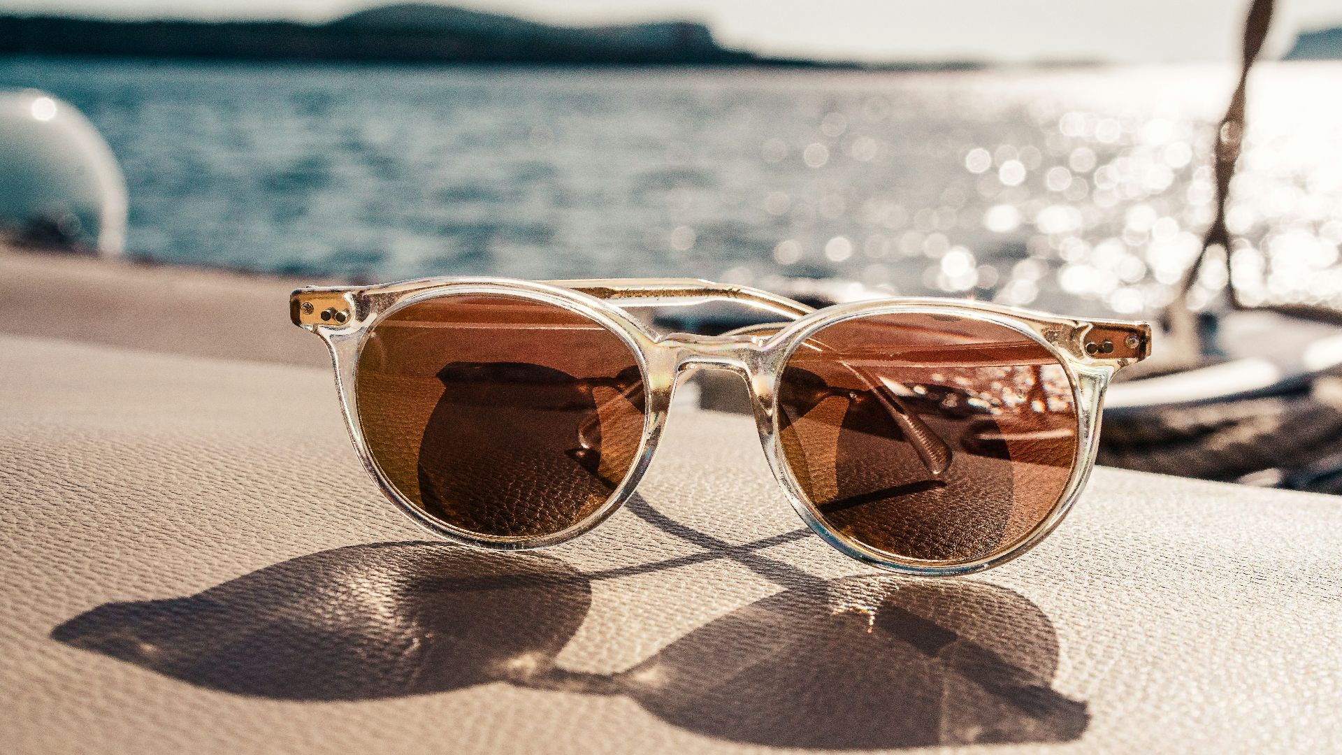 white framed brown lens sunglasses