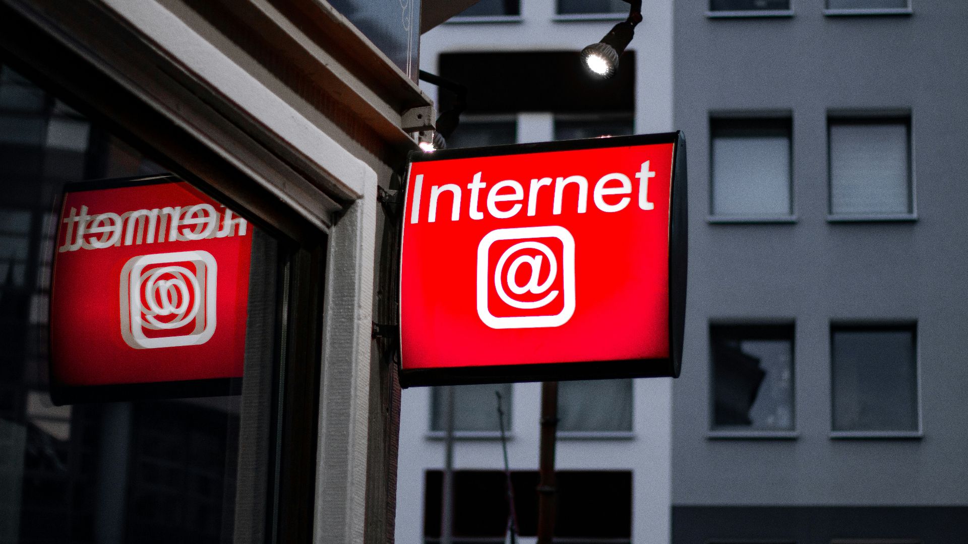 Internet LED signage beside building near buildings