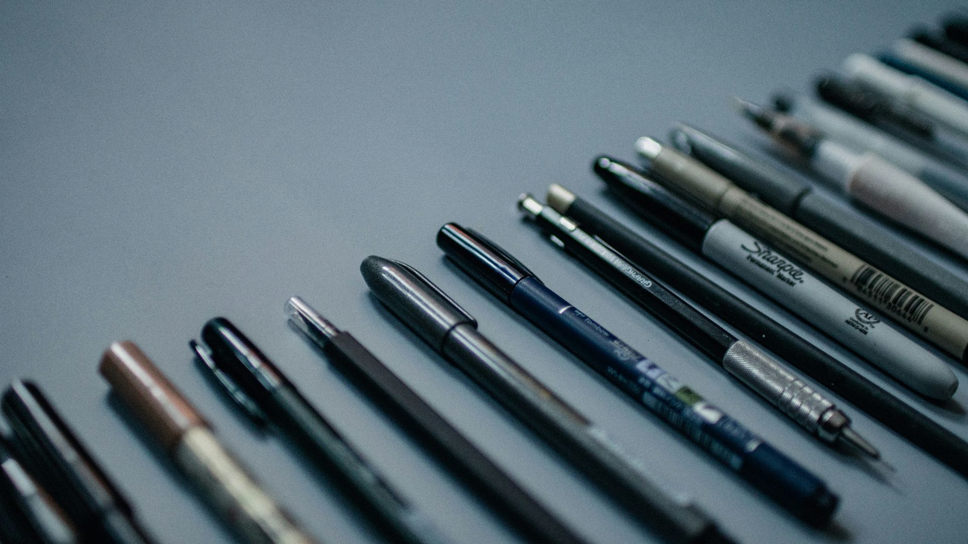 blue and silver click pen