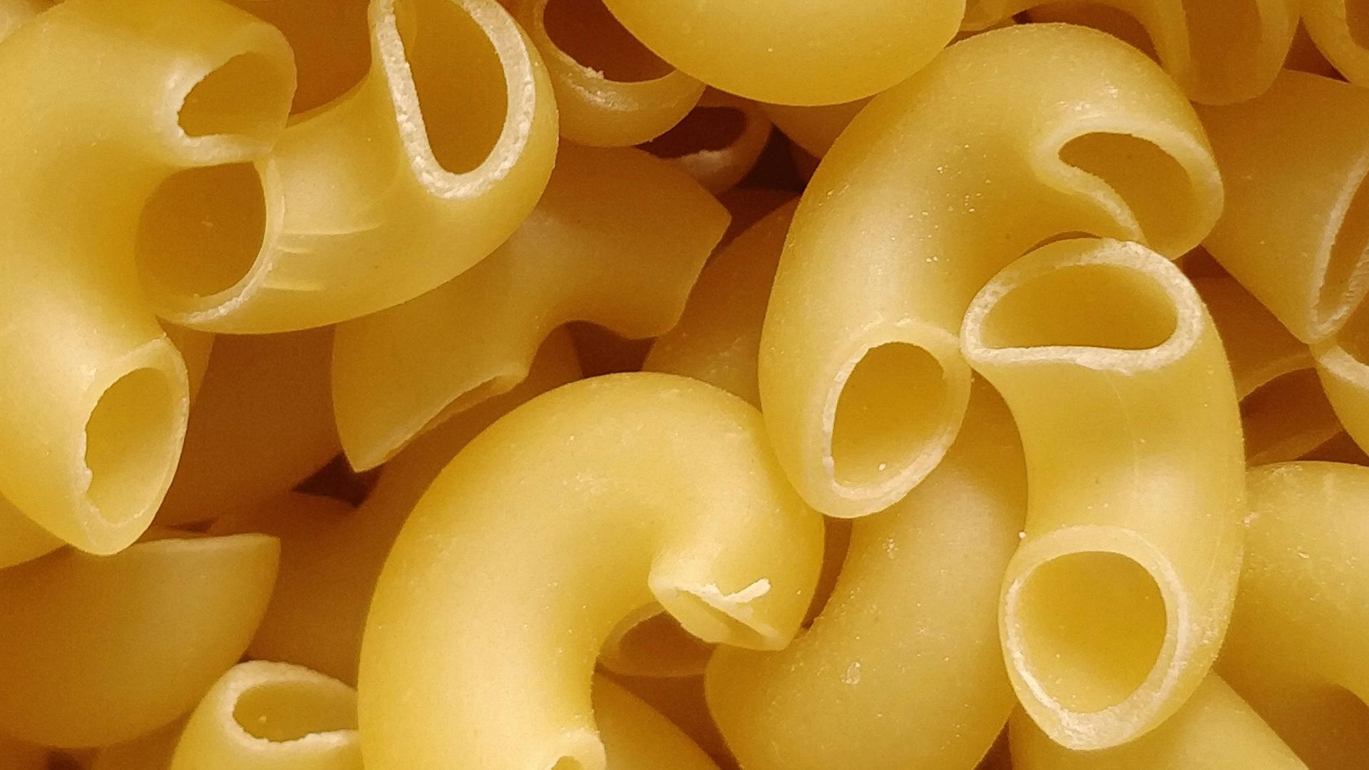 yellow rubber balloons in close up photography