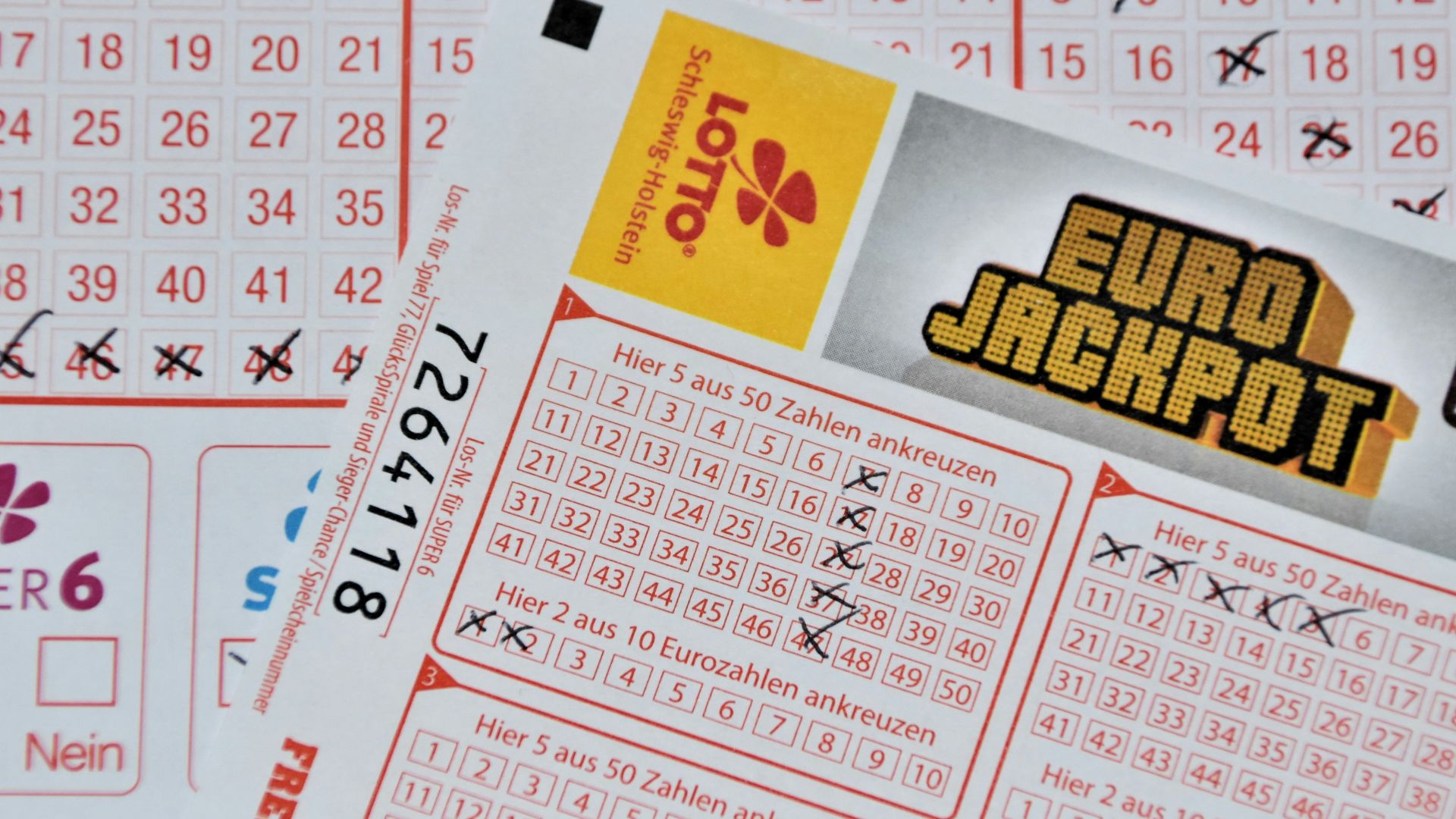 white and red calendar on white wall