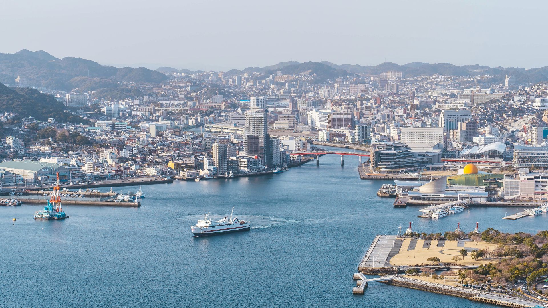 a large body of water surrounded by a city