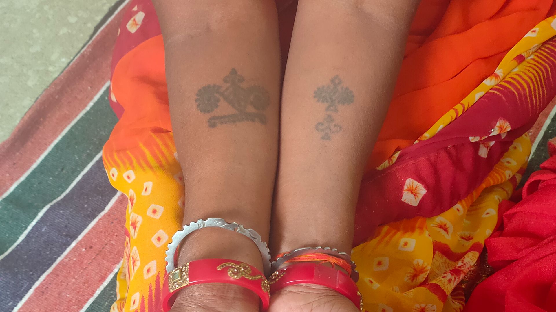 File:Naiyyasi residents displays her traditional tattoos.jpg