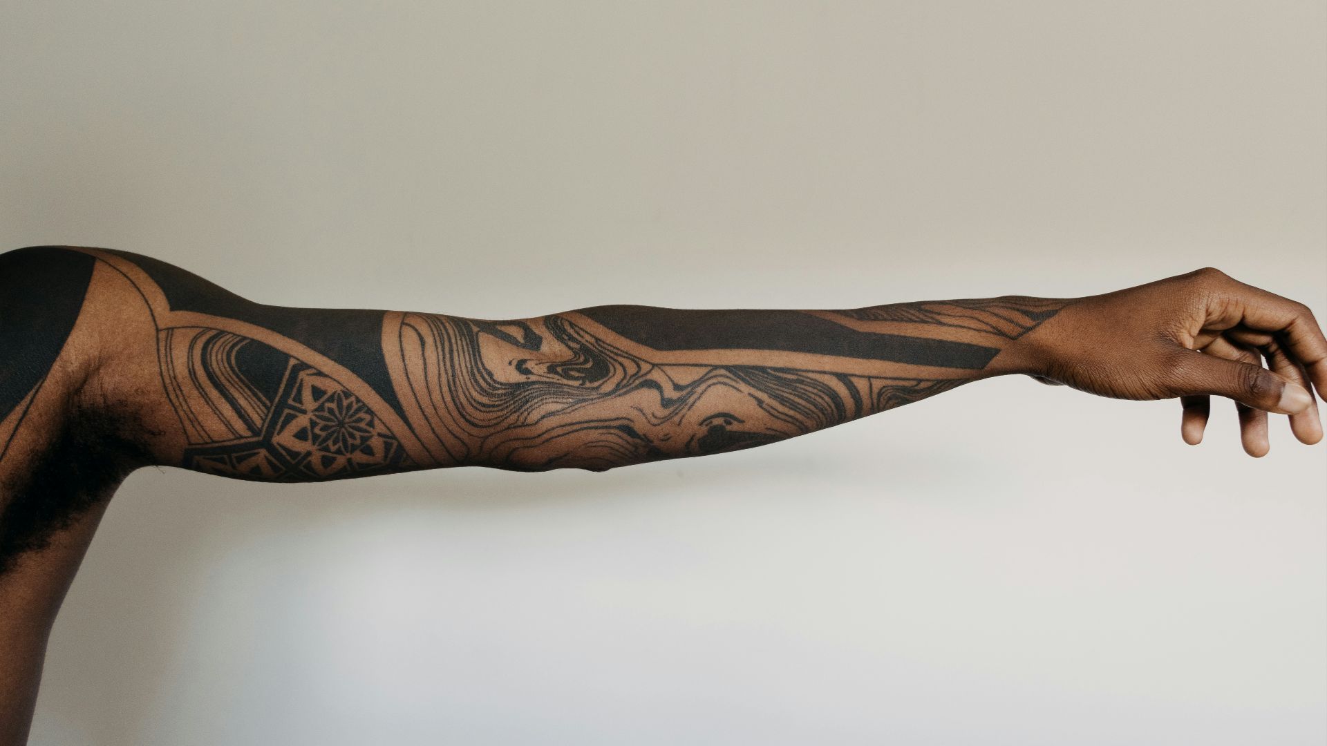 black and brown tribal tattoo