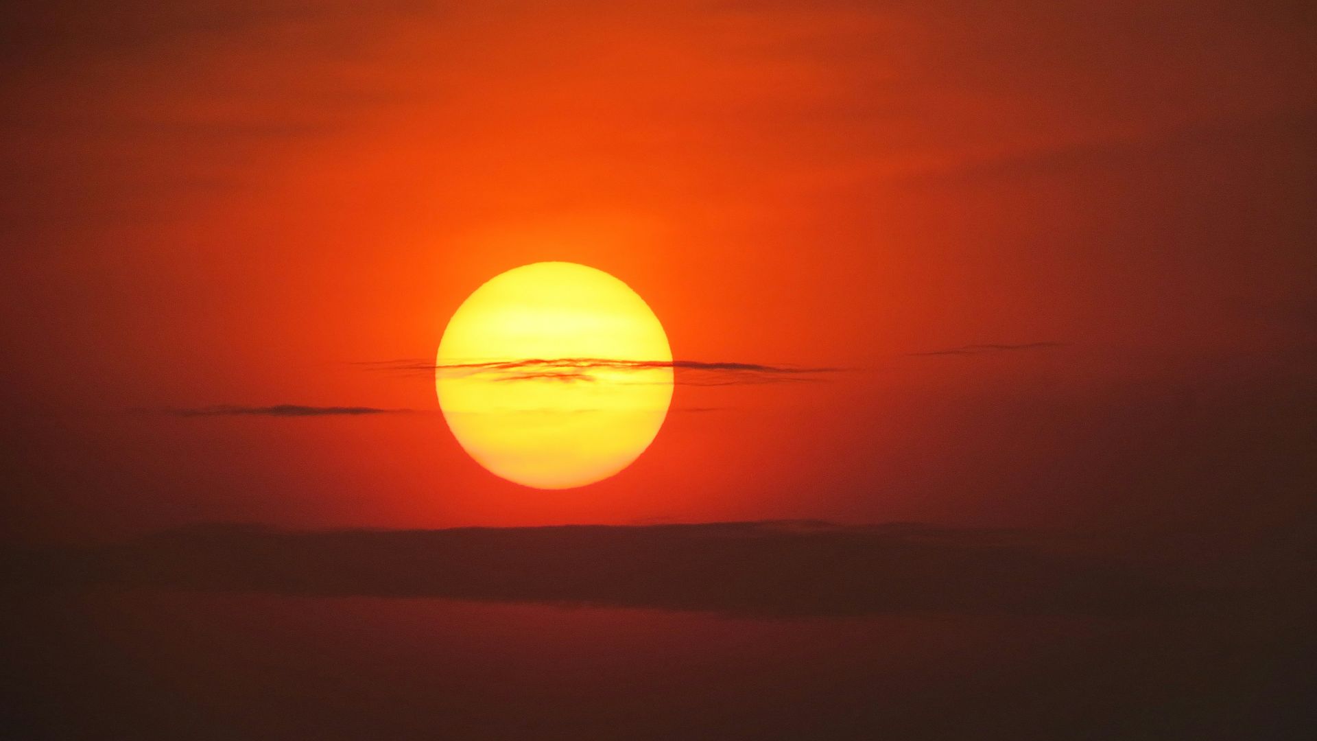 sun setting over the horizon