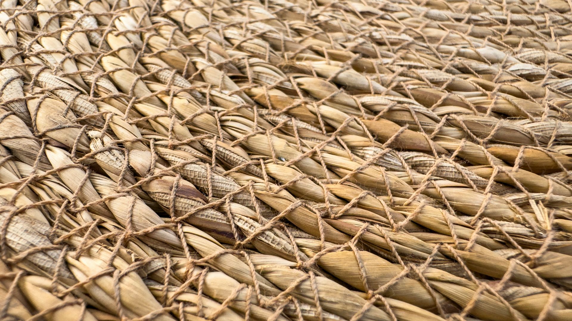 Close-up of woven natural fibers with crisscross pattern