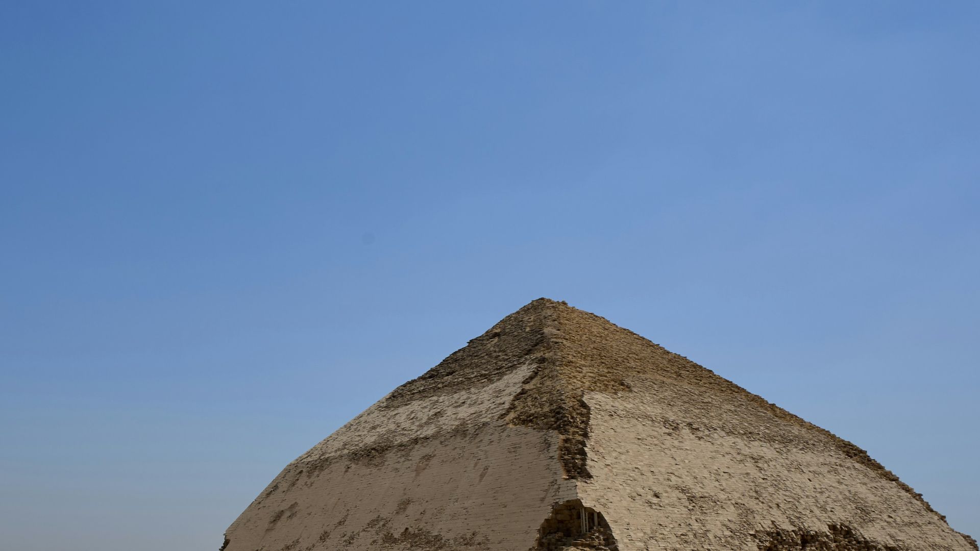 a large pyramid in the middle of a desert