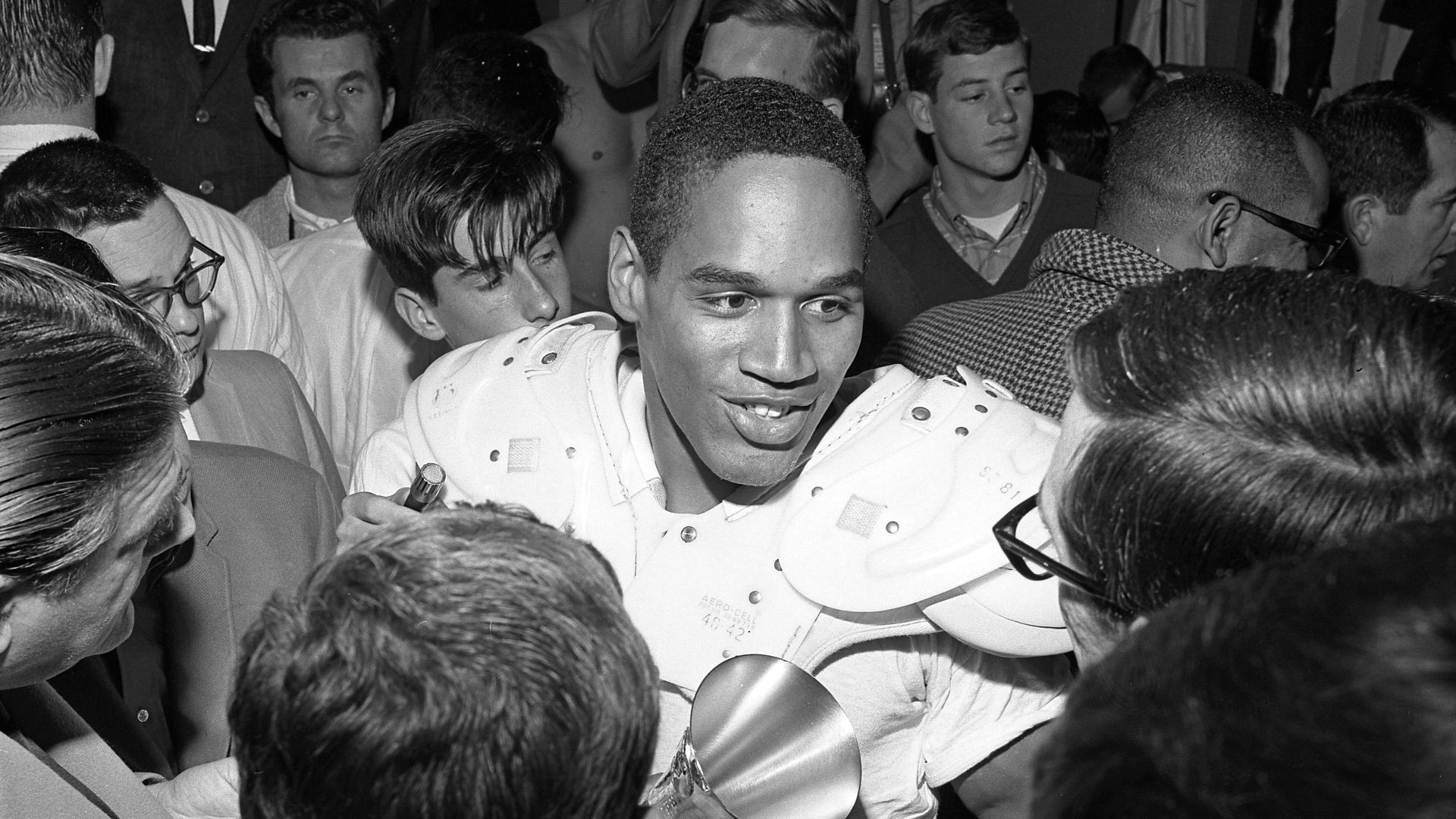 File:O.J. Simpson talking to reporters, 1967.jpg
