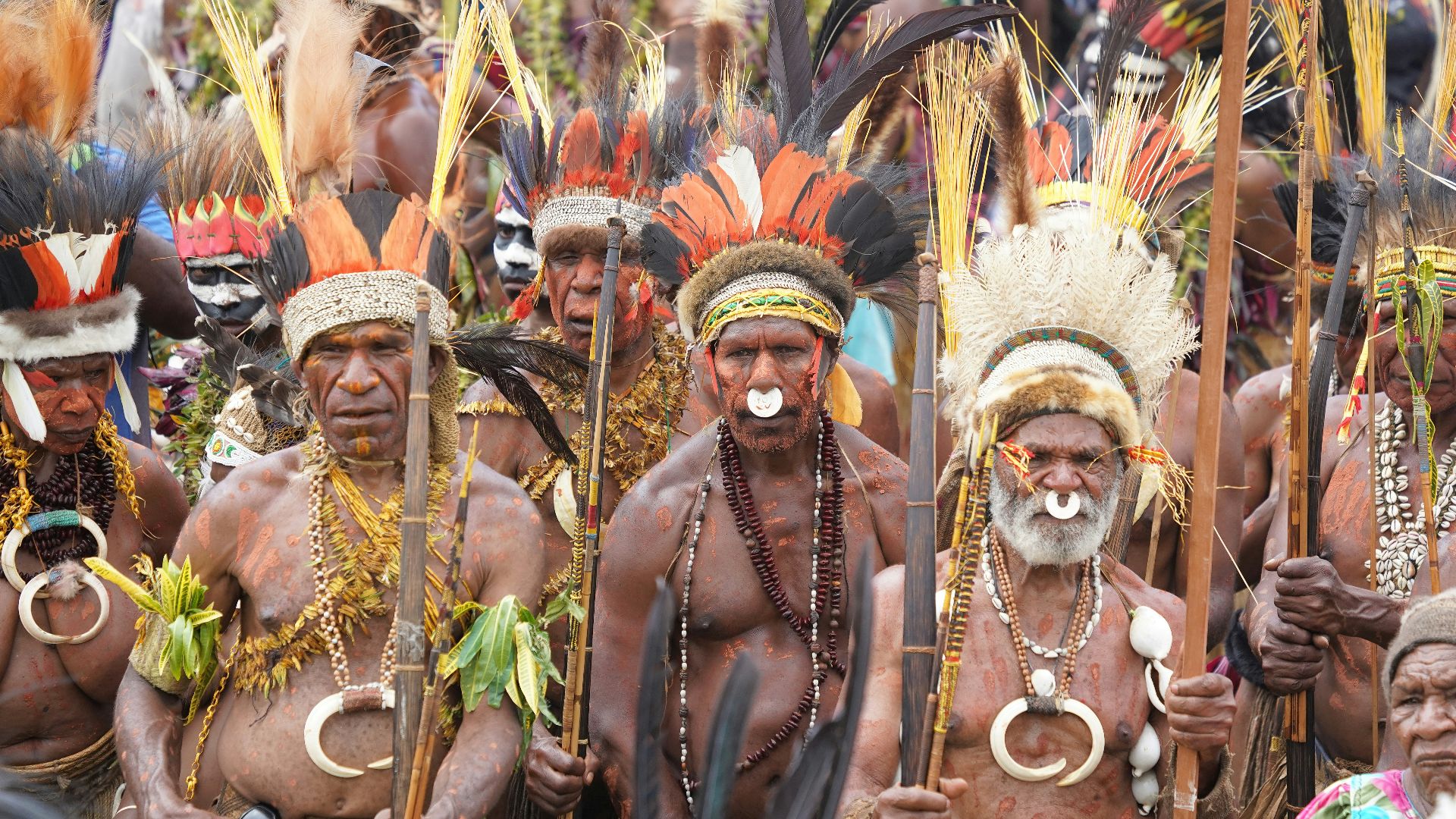 people in traditional dress with mask