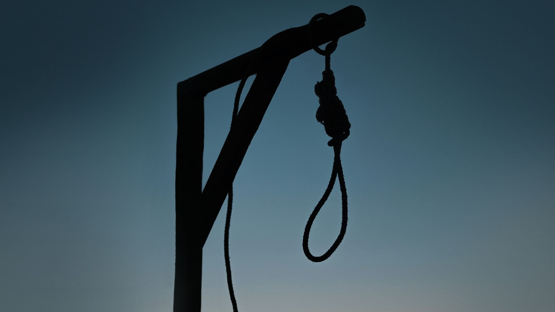 a black and white photo of a telephone pole