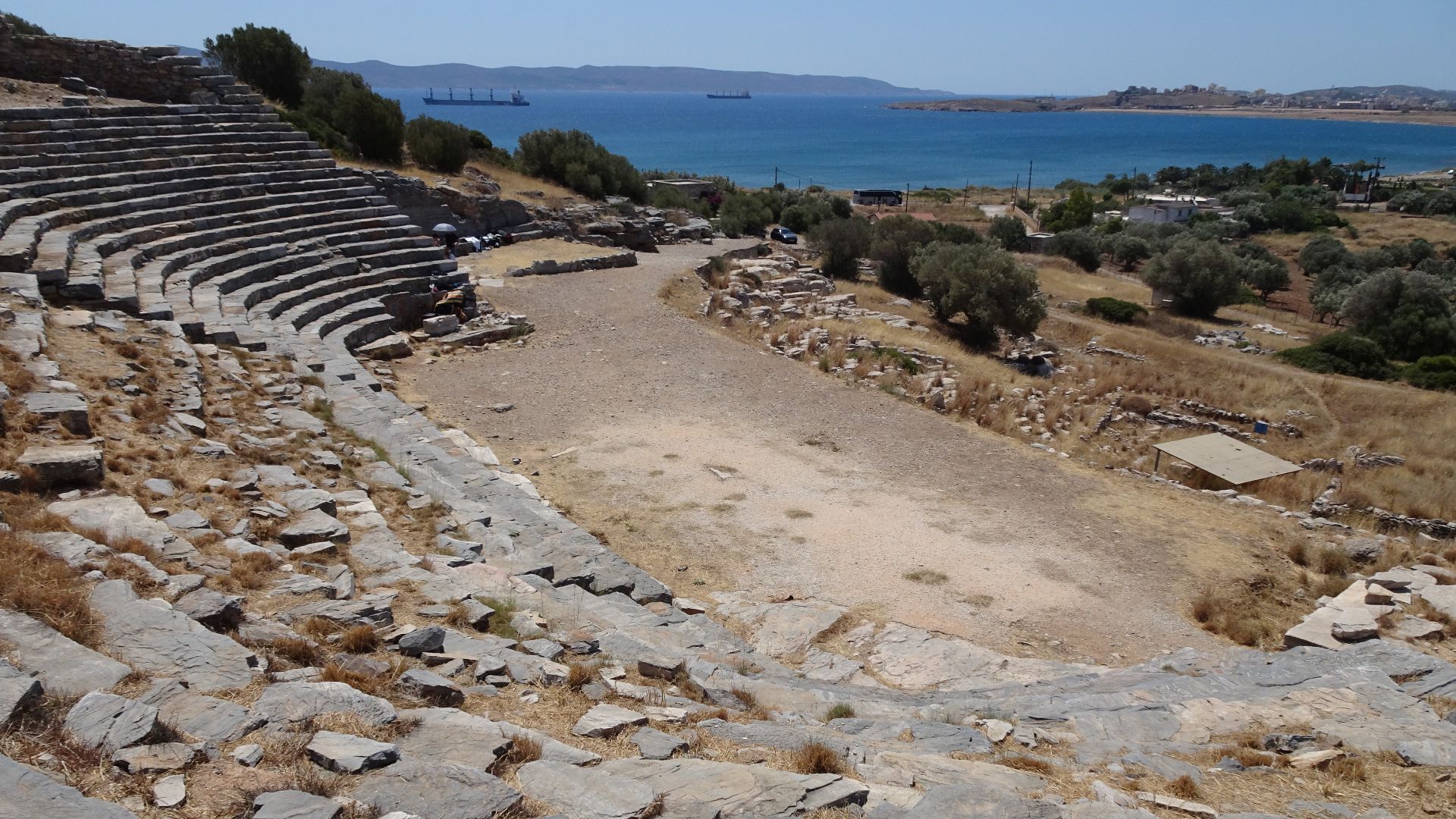 File:Theater of Thorikos (seats and orchestra) and sea.jpg