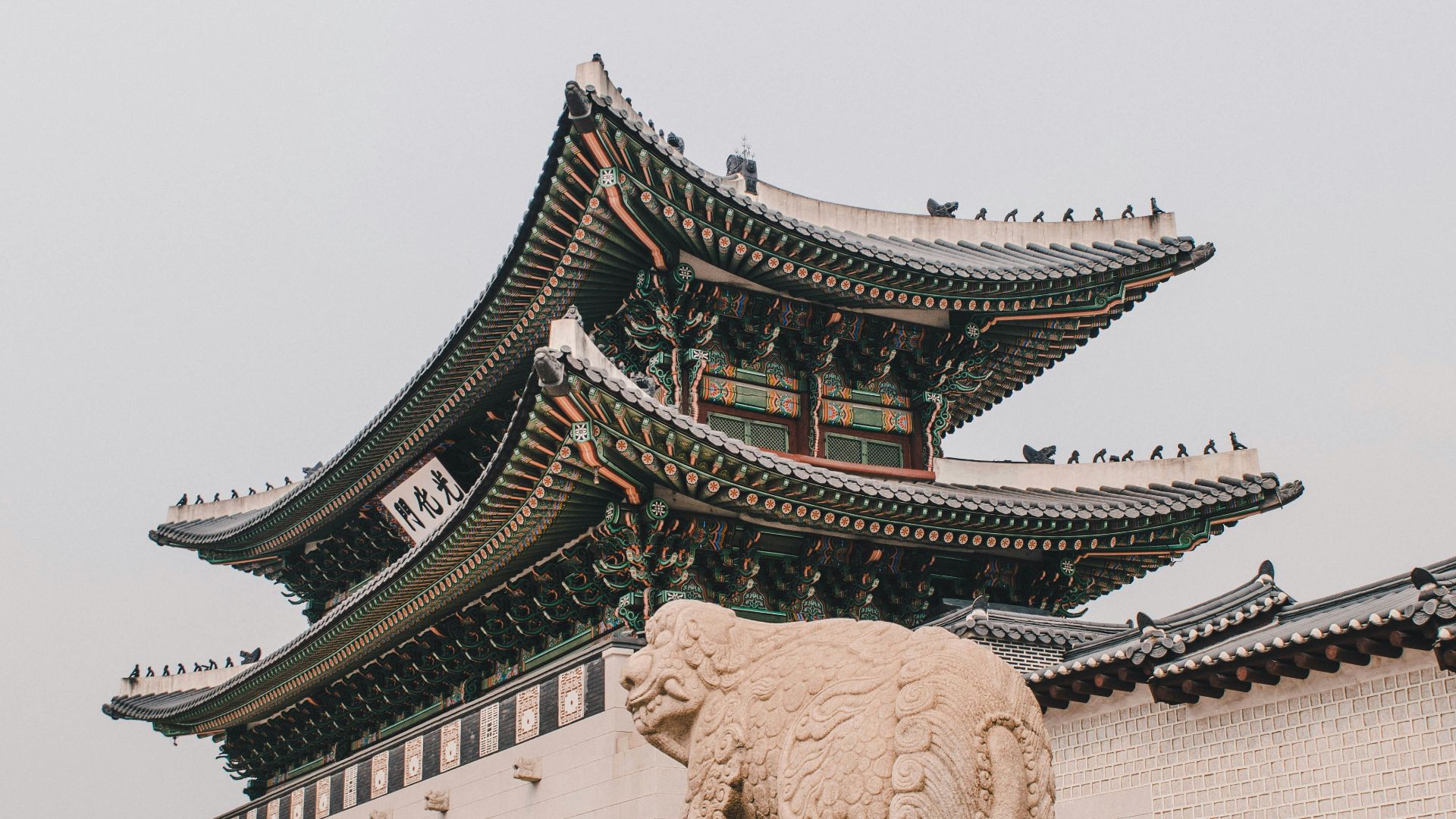 people walking on street near white concrete building during daytime