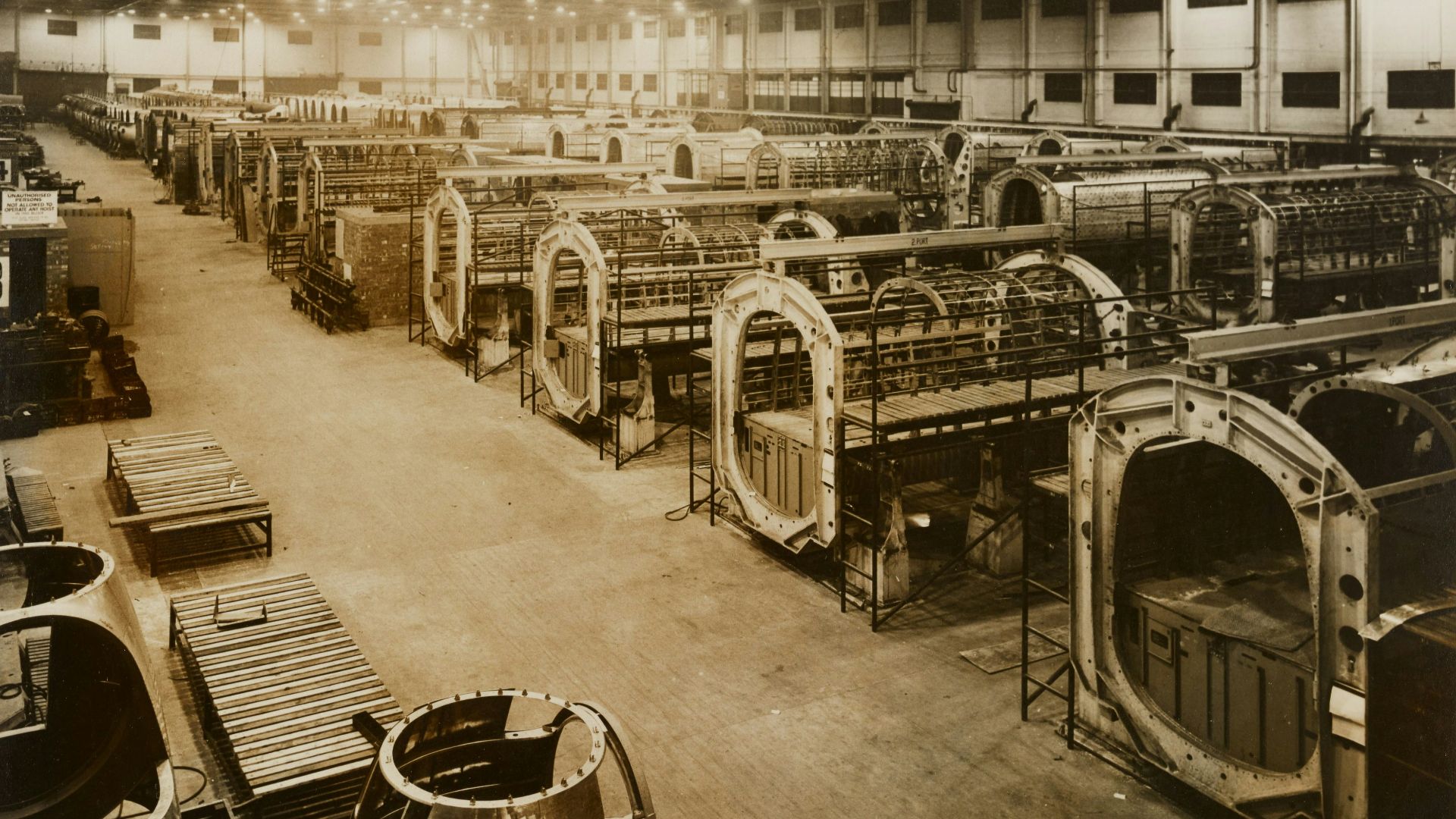 grayscale photo of metal chairs and tables