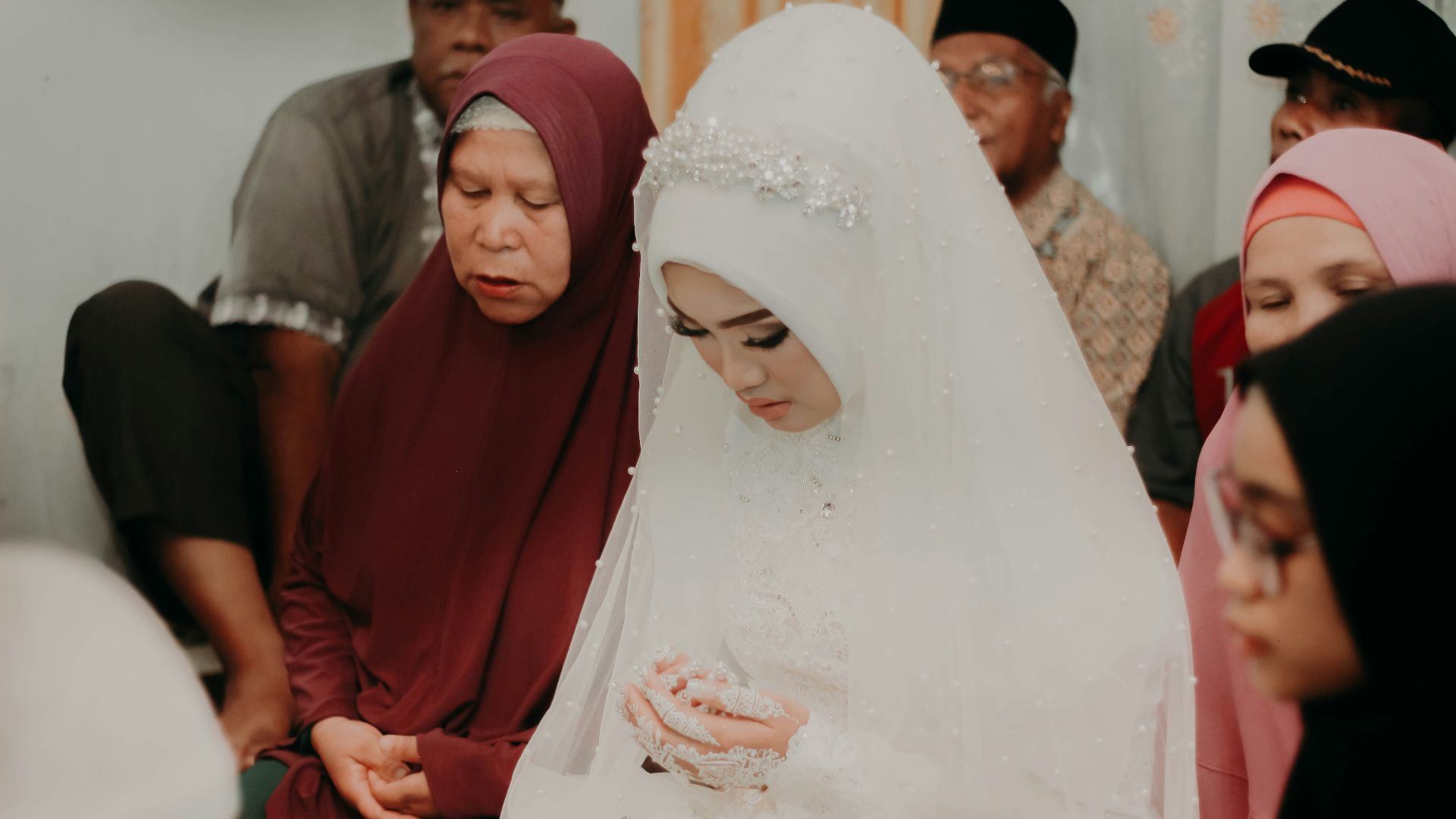 group of person praying indoor