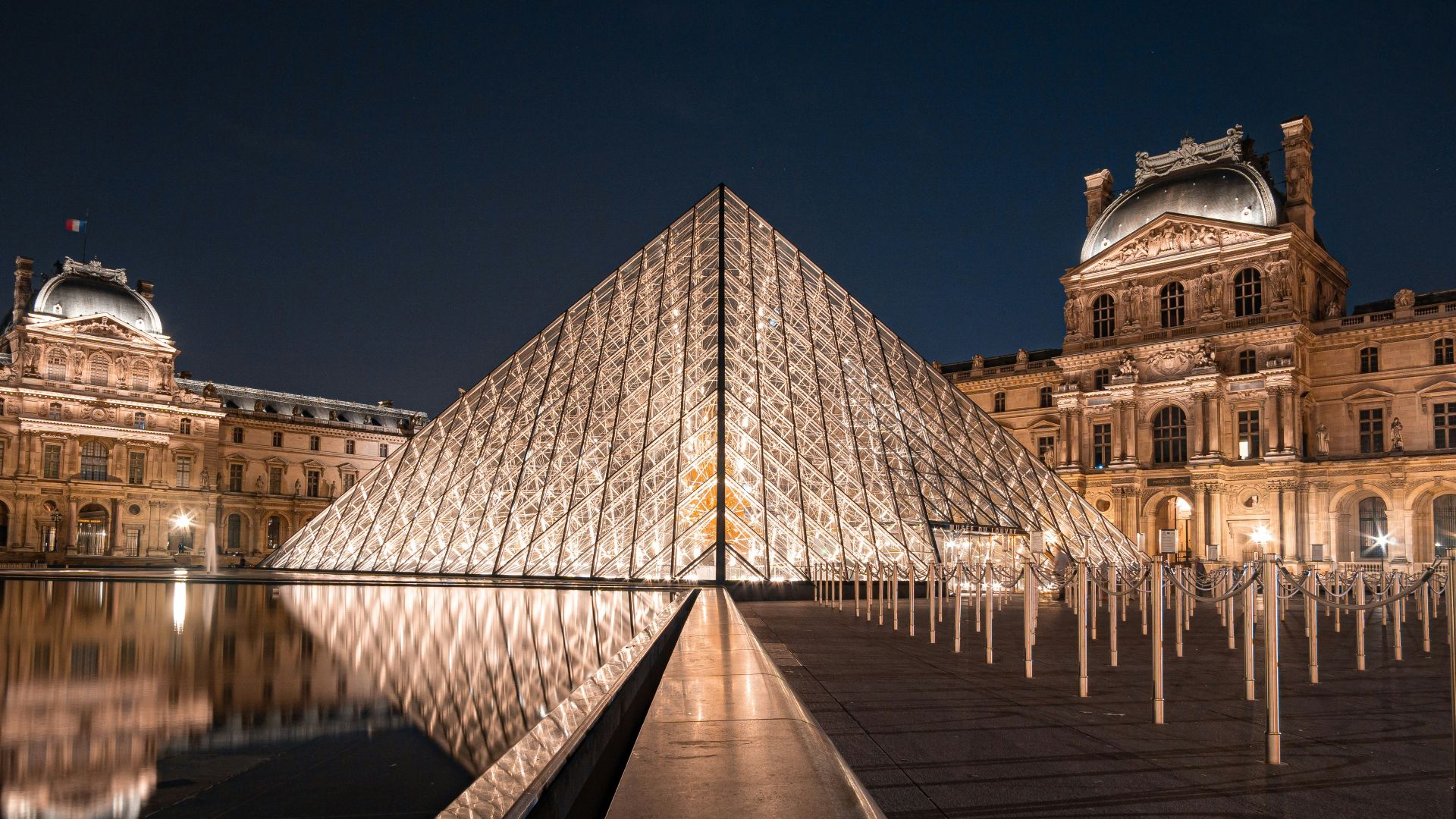 brown concrete building during night time