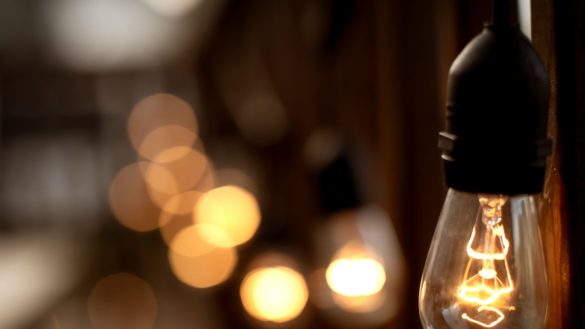 selective focus photography of light bulb