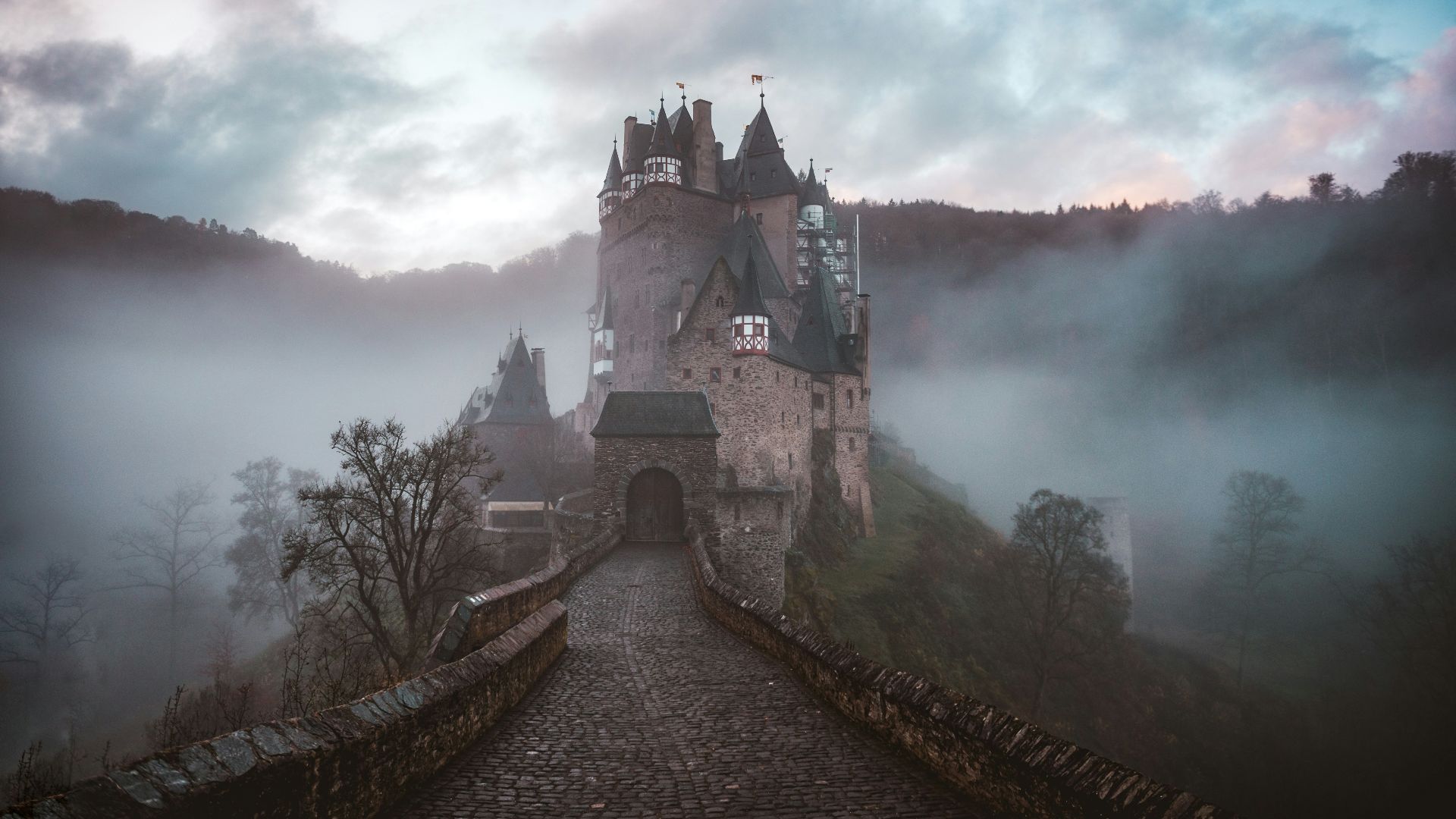 closeup photo of castle with mist