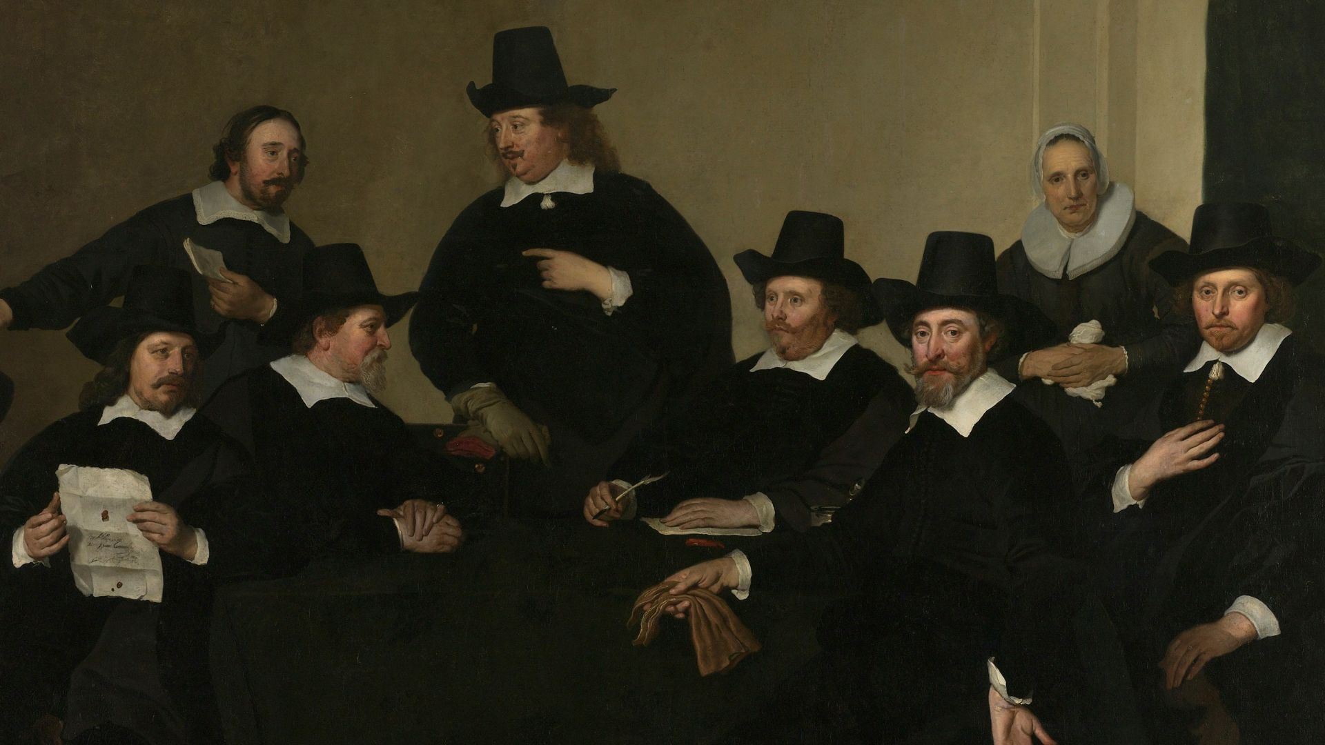 group of men in black suit