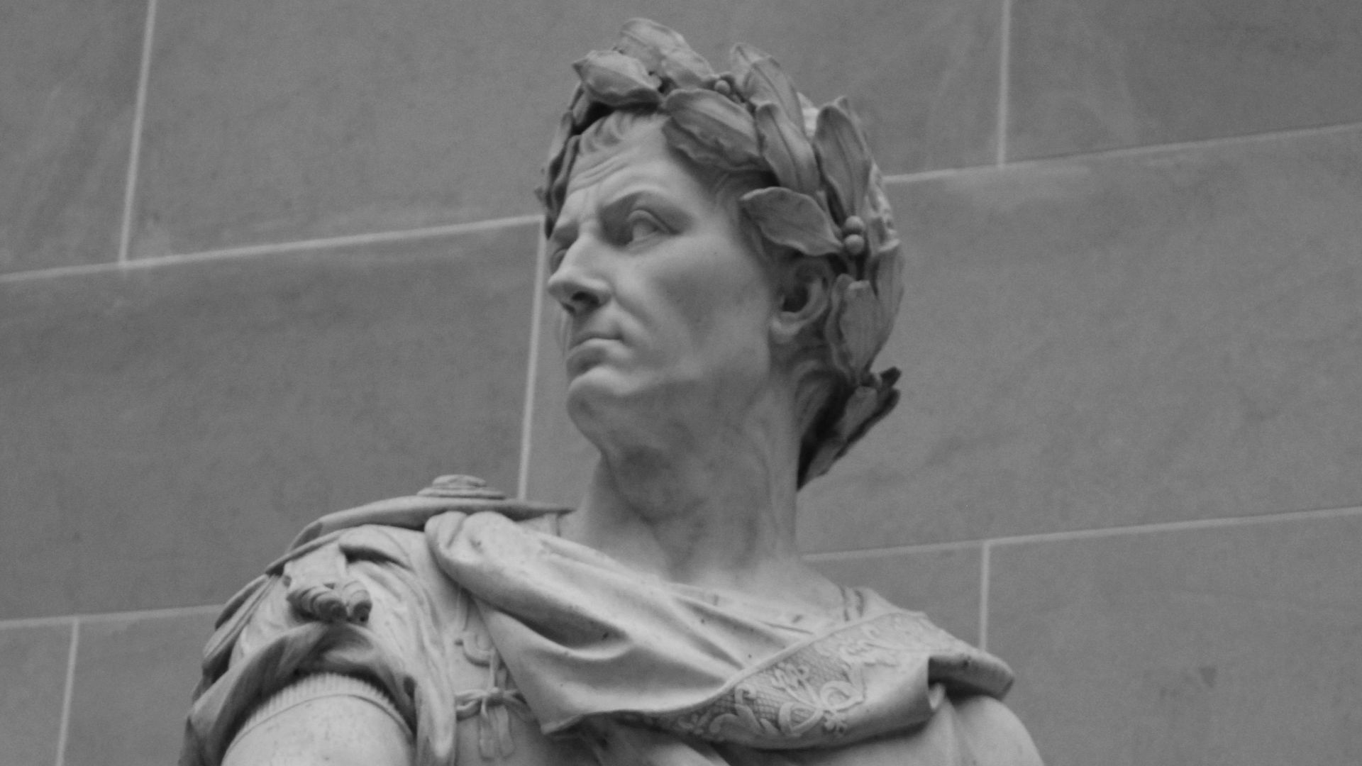 A statue depicts a roman emperor.