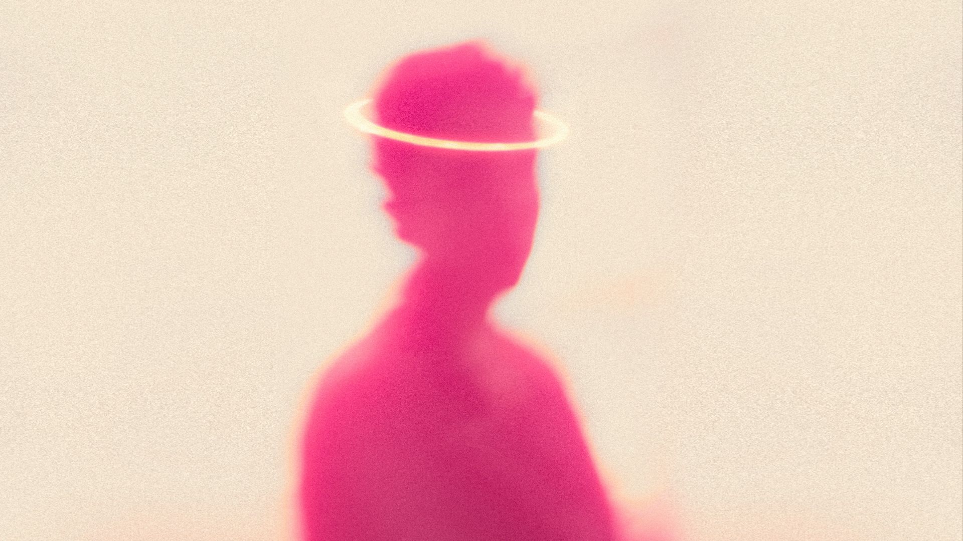 person in purple shirt with white cap