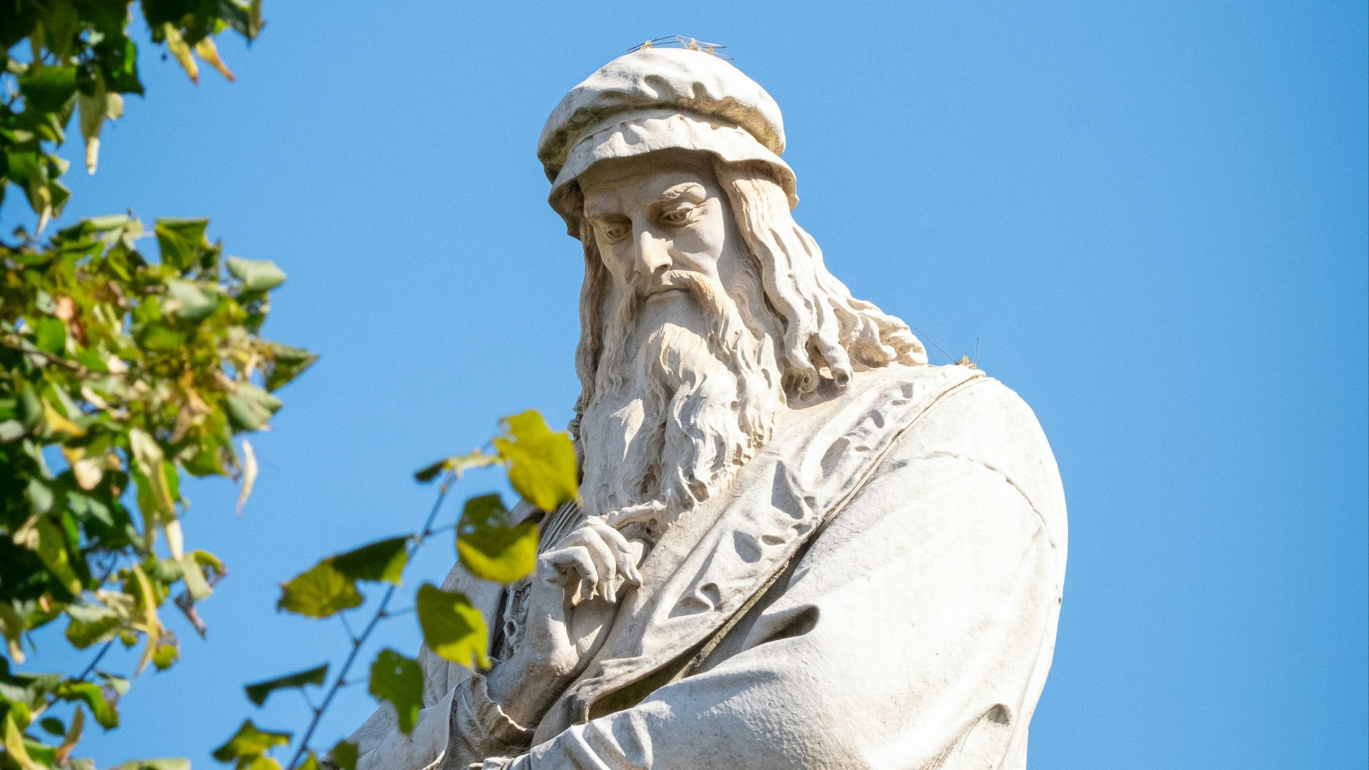 A statue of a man with a long beard