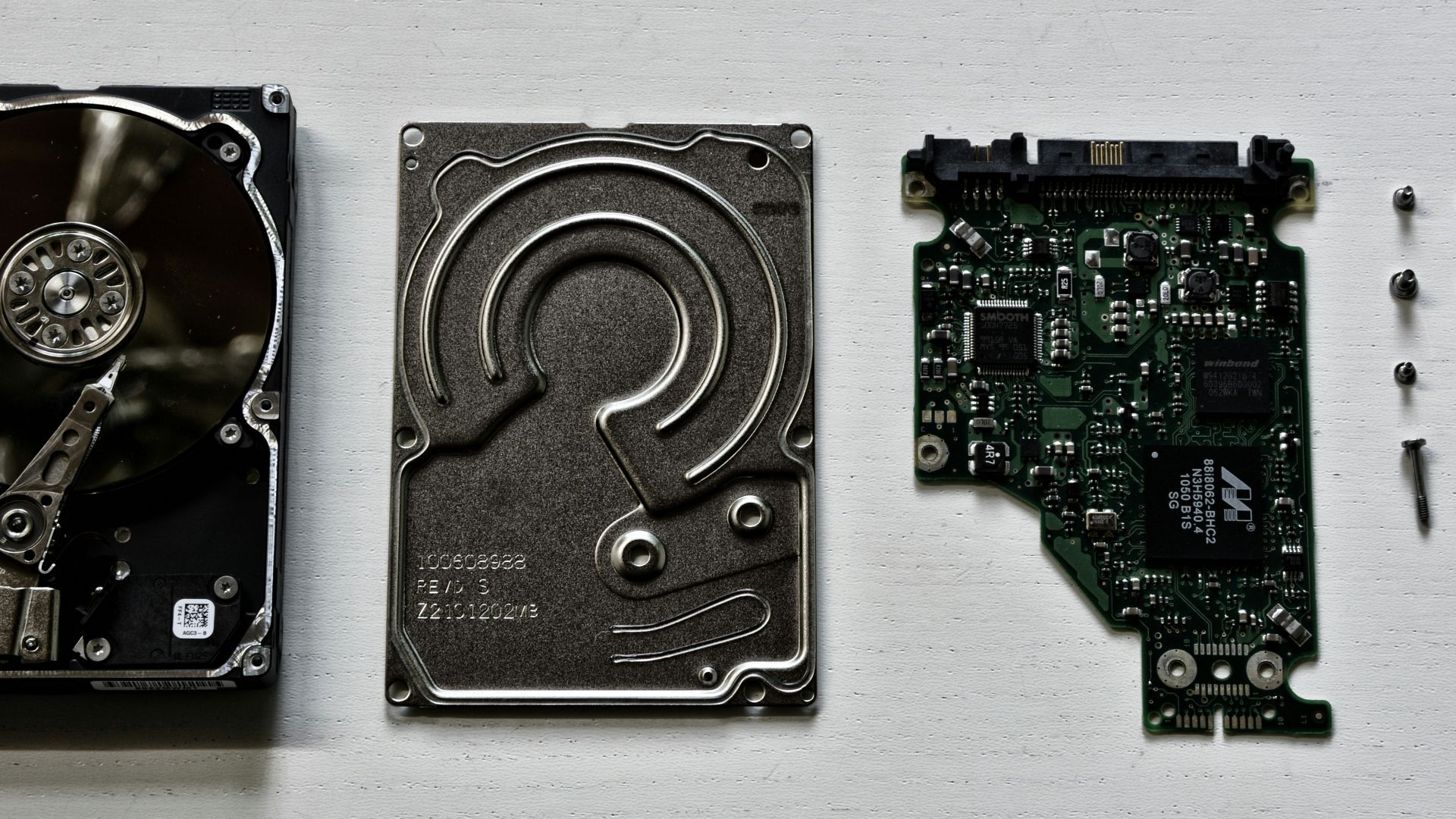 black and green computer hard disk drive