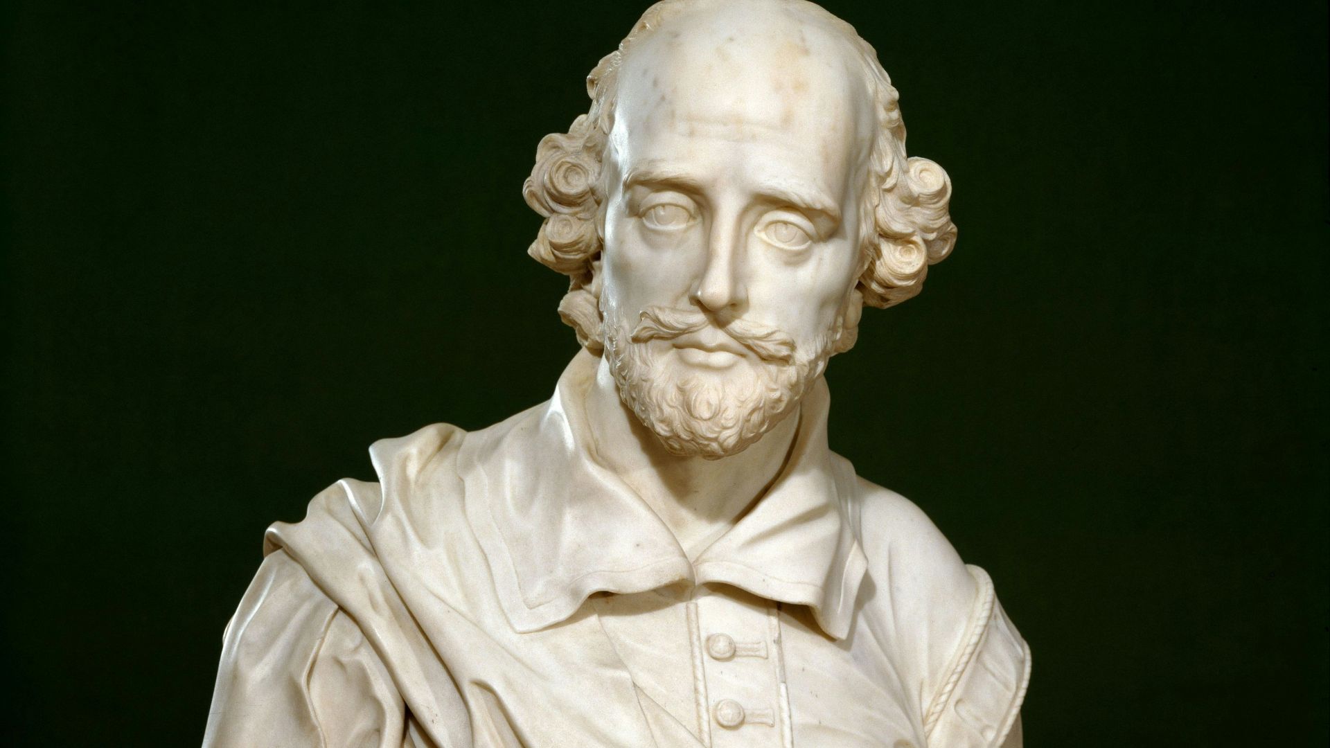 white ceramic man head bust