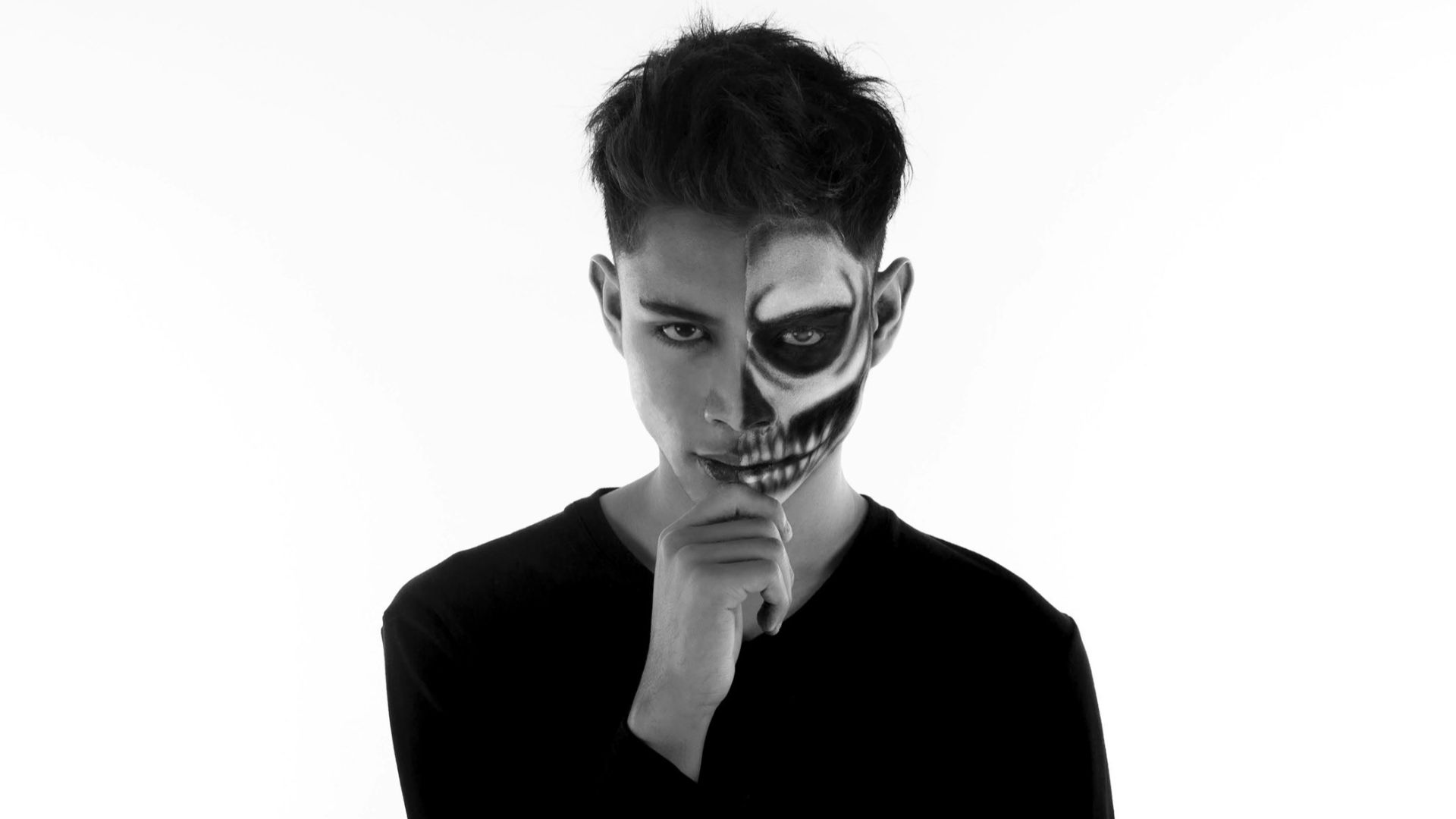 man in black long sleeve shirt wearing mask