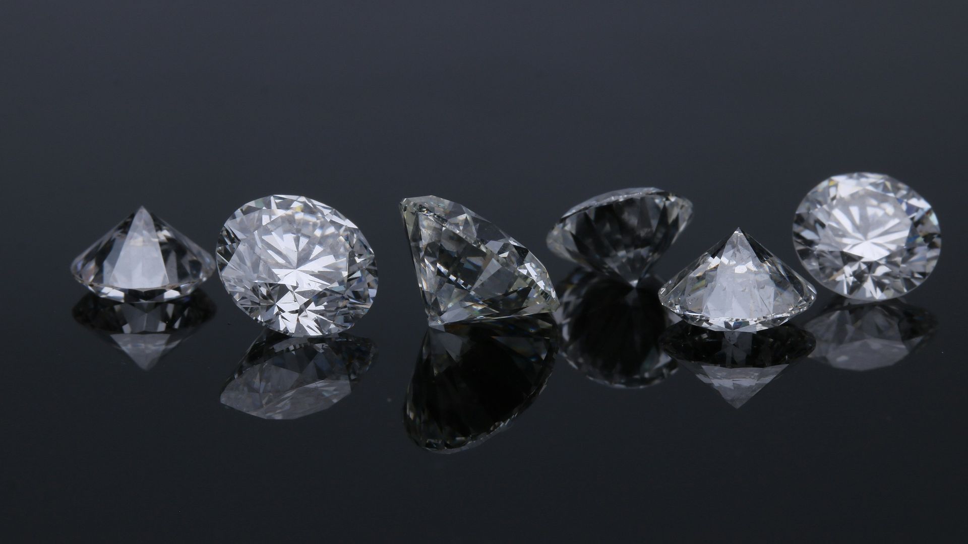 two diamond studded silver rings