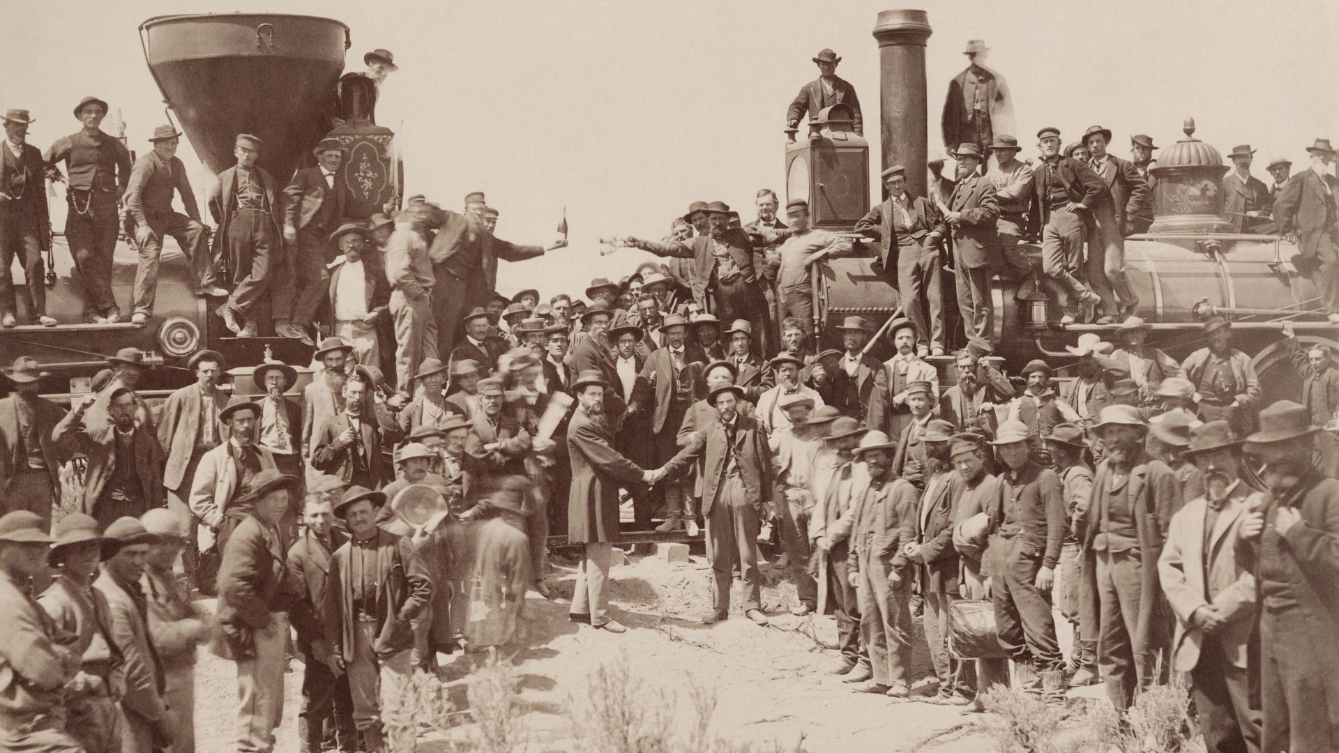 File:East and West Shaking hands at the laying of last rail Union Pacific Railroad - Restoration.jpg