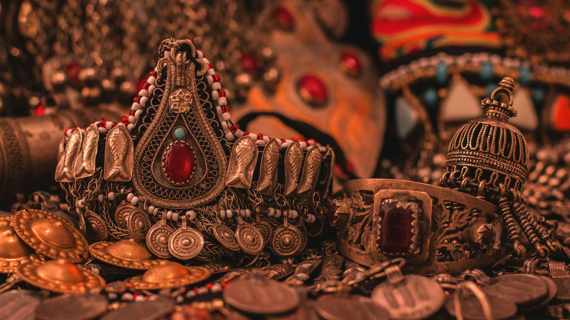gold and red crown on brown wooden table