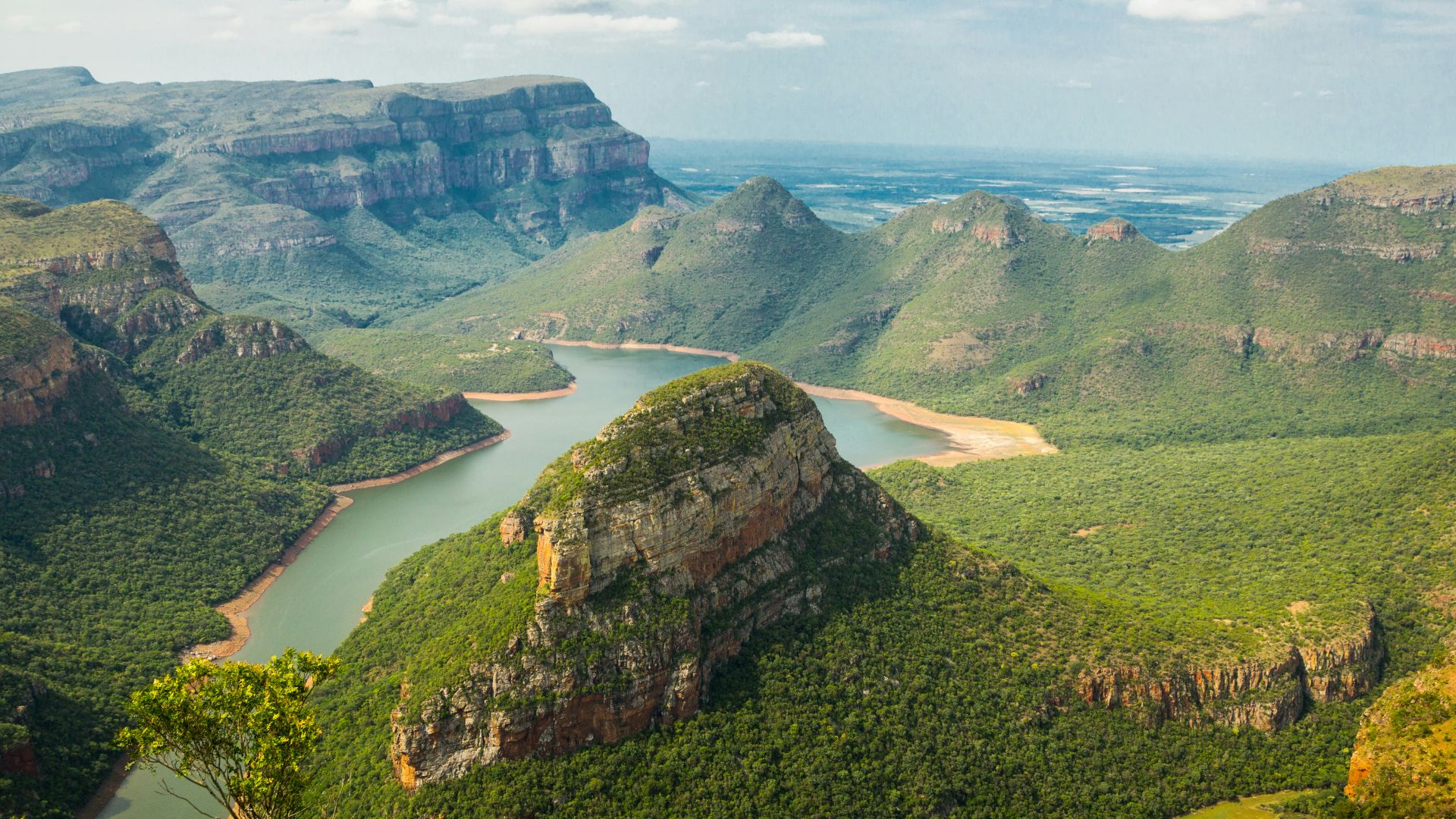 landscape photography of mountains under blue sky