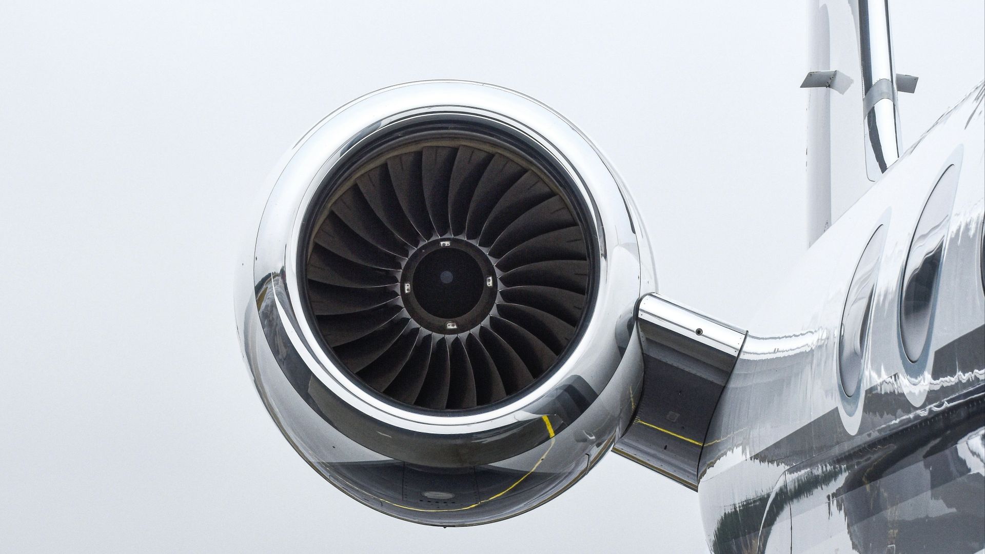 a large jetliner sitting on top of an airport tarmac