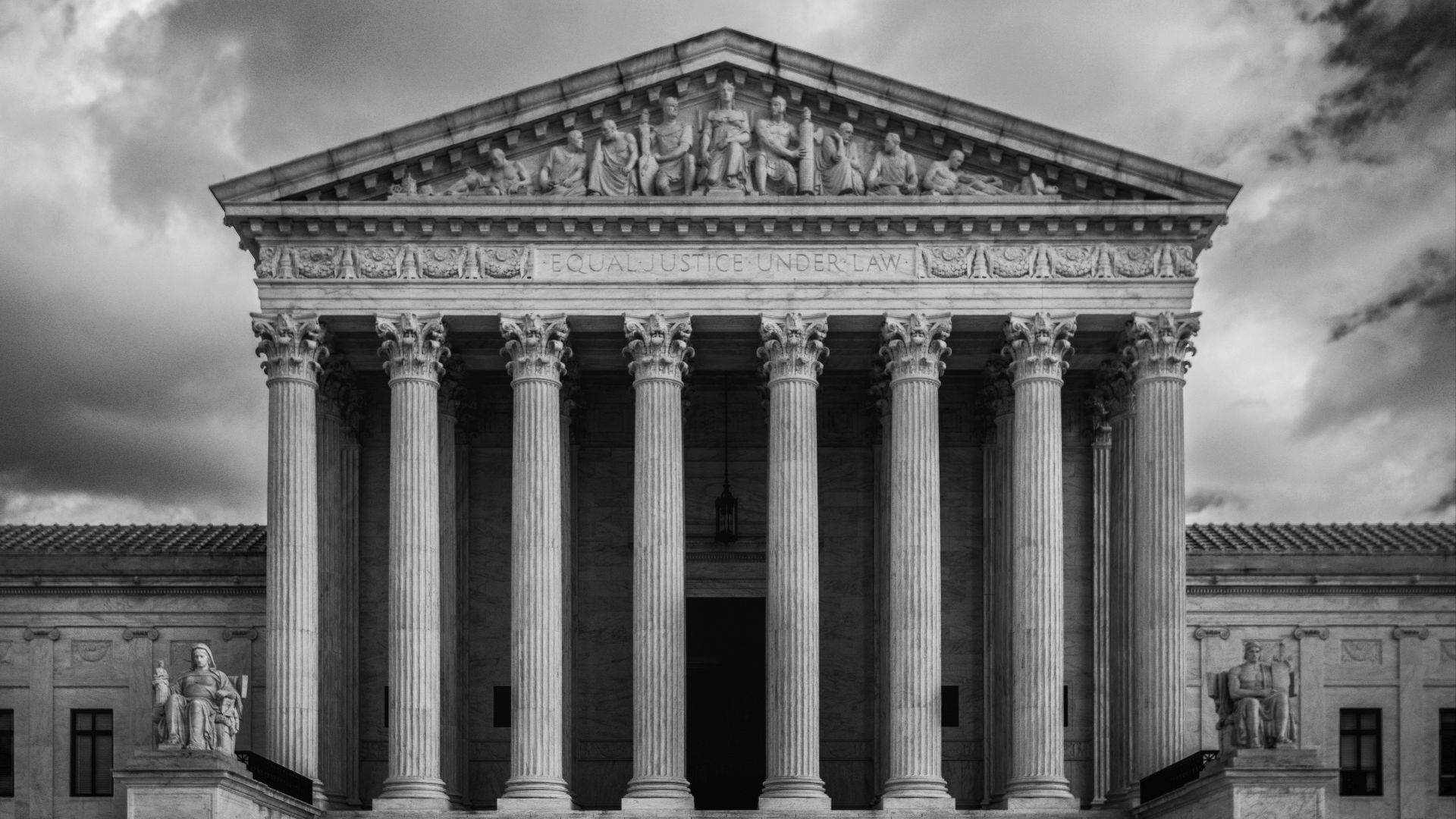 a black and white photo of the supreme court