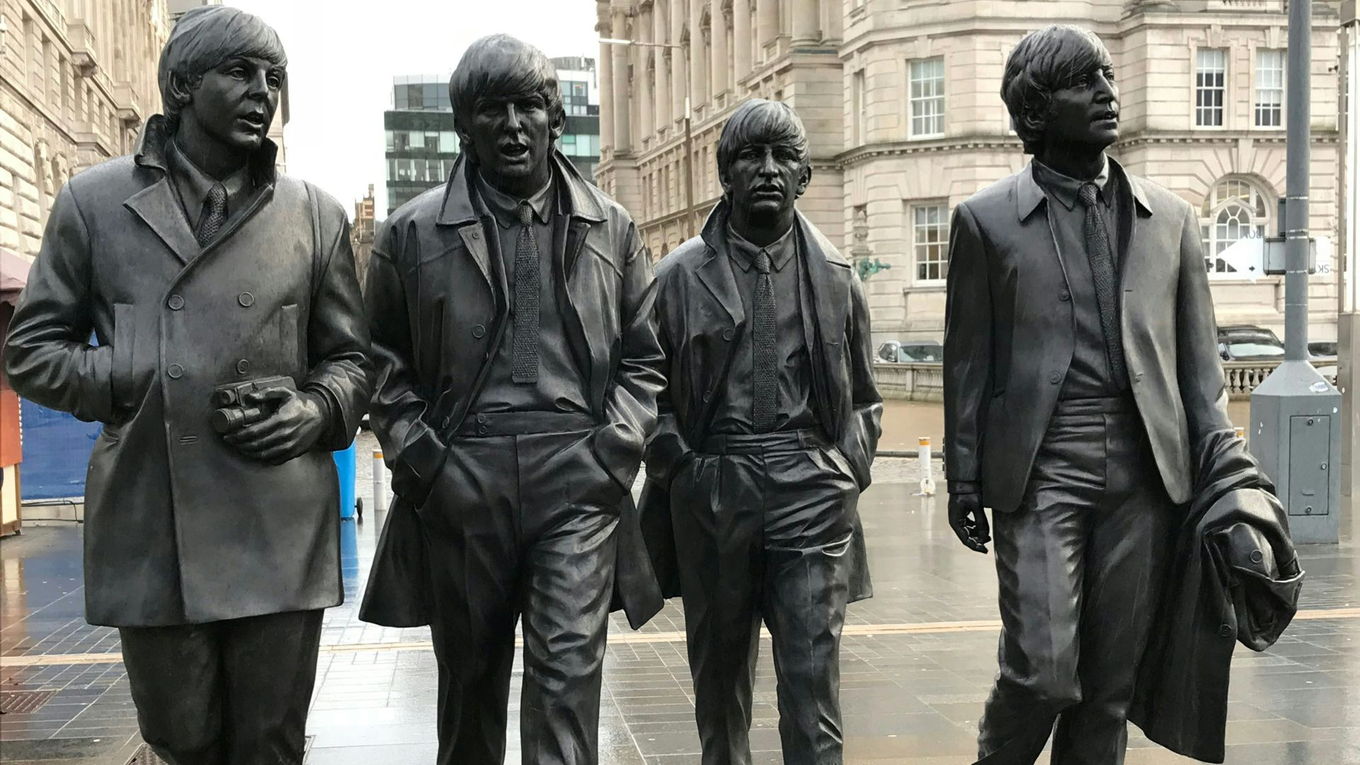 4-men group band statues