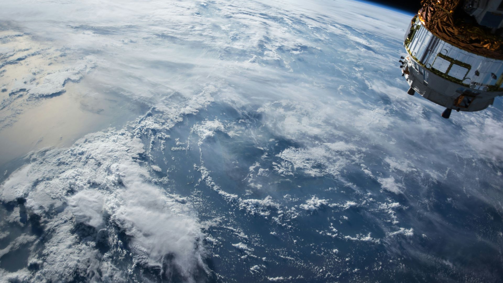 view of Earth and satellite