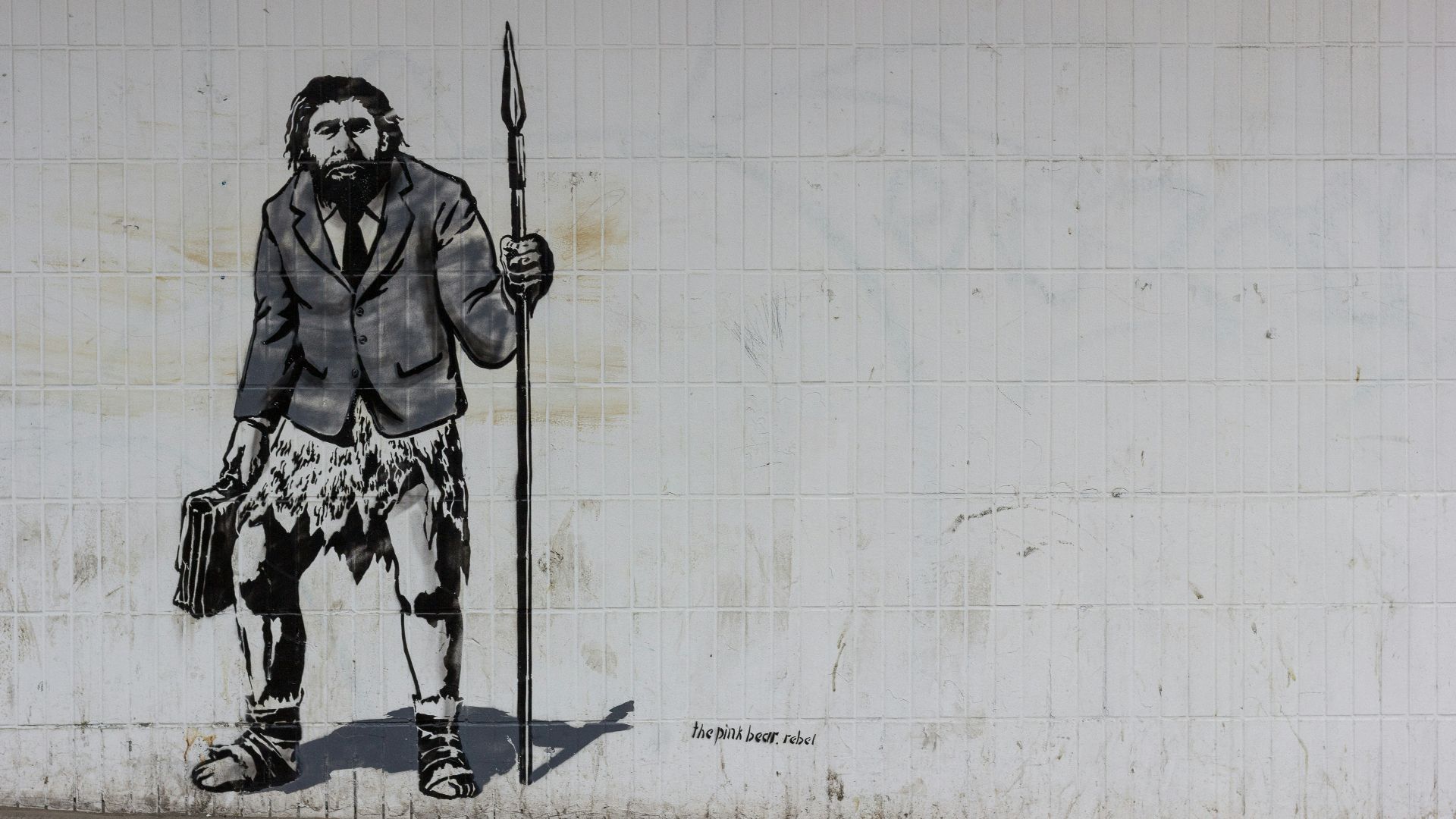 man holding spear wall painting