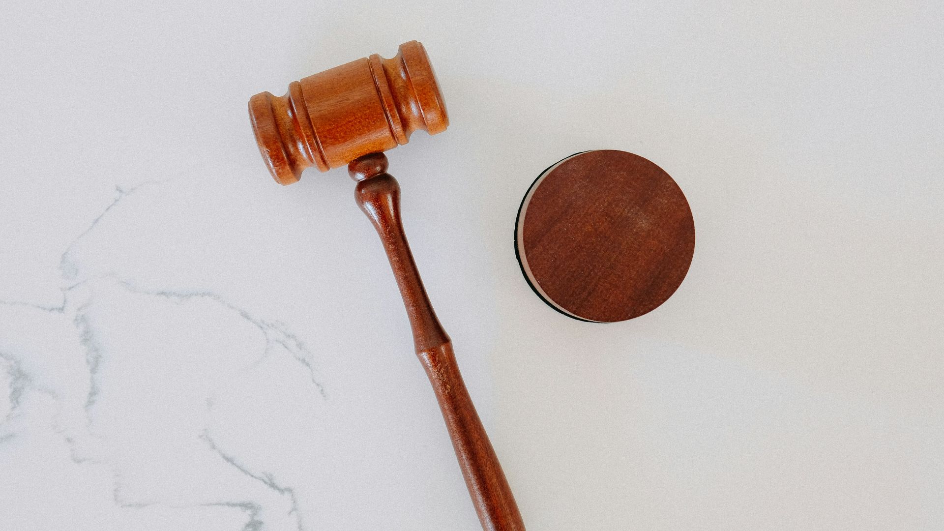 brown wooden smoking pipe on white surface