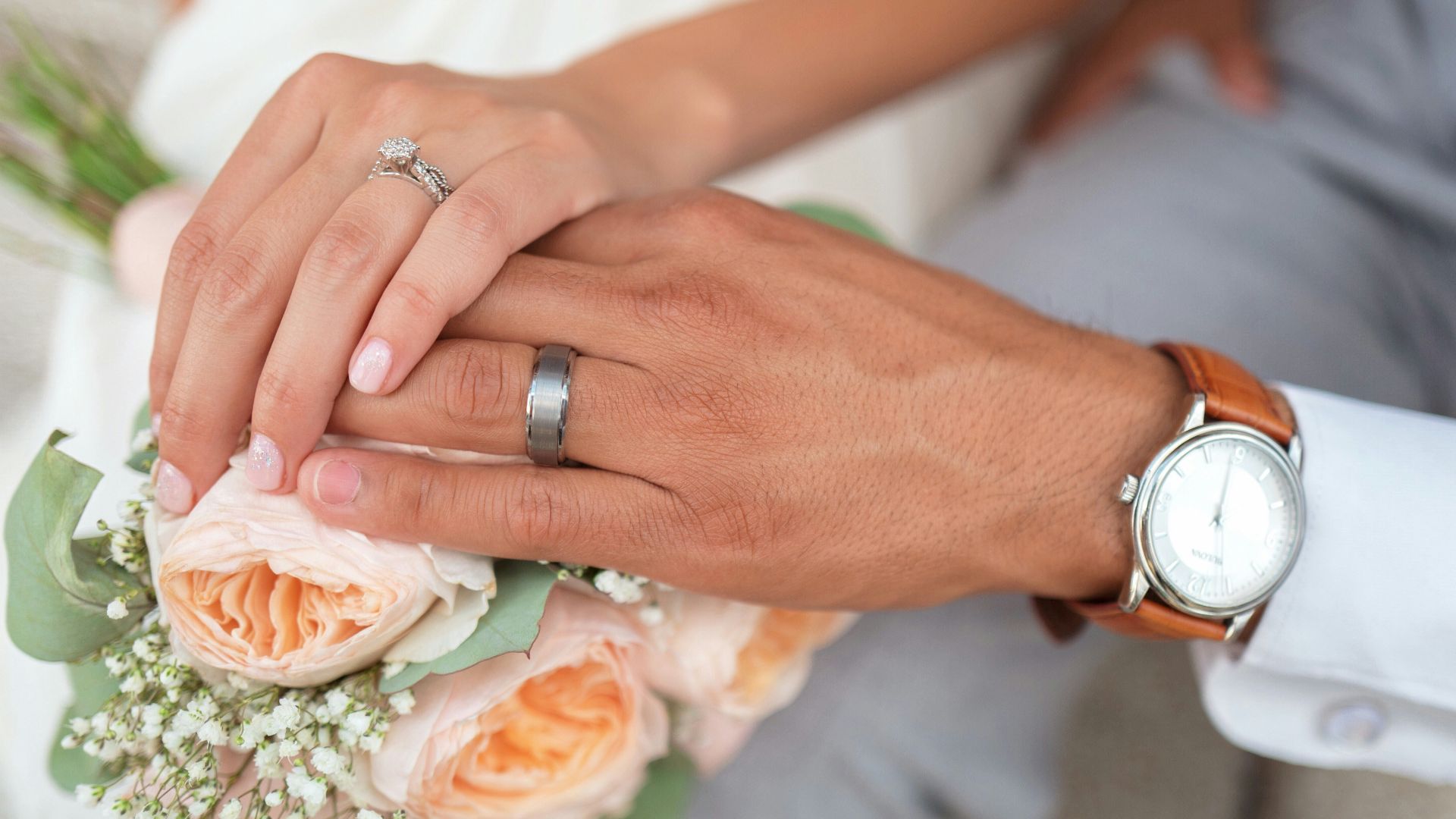 man and woman holding hands