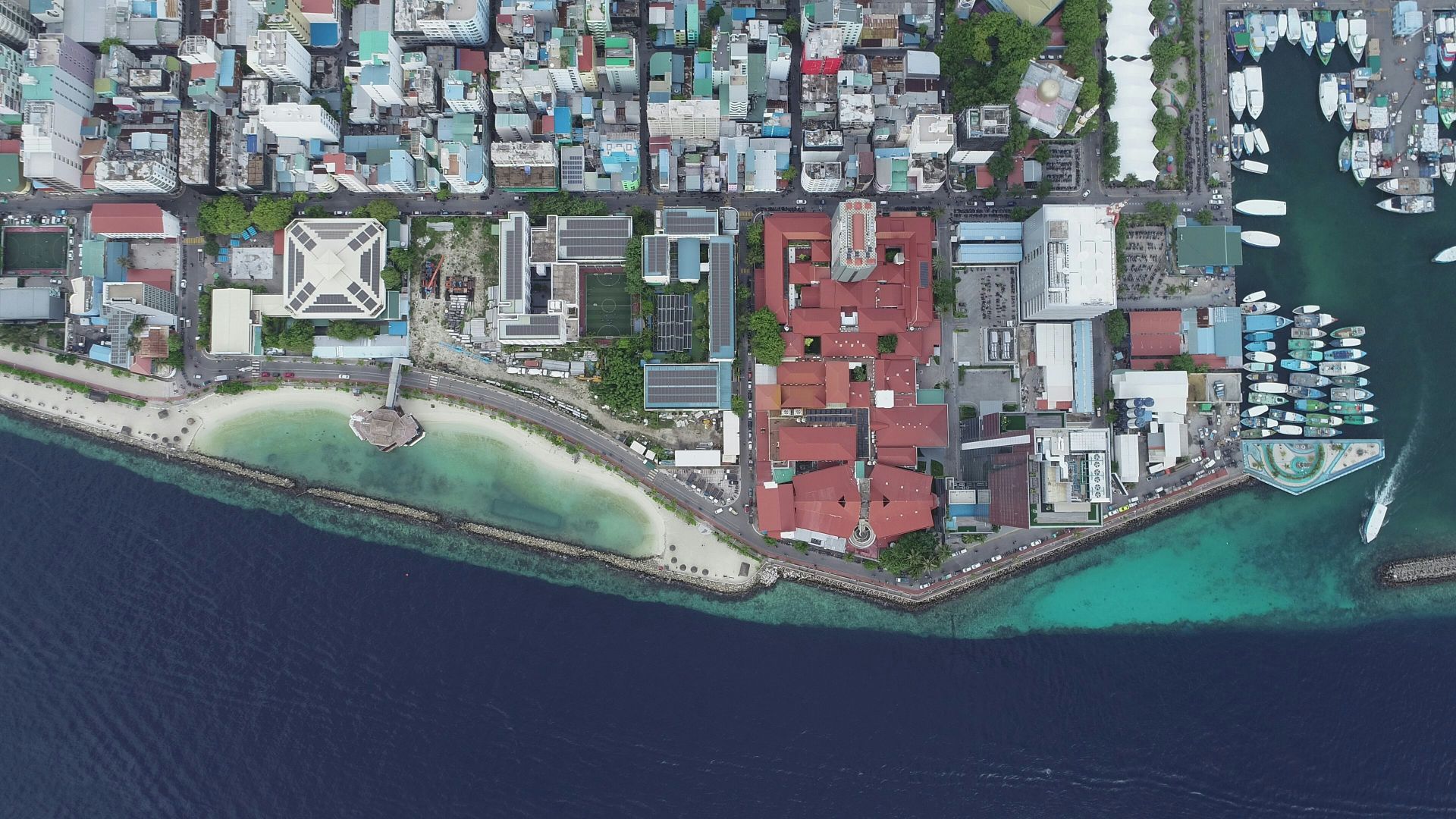 high-angle photography of red and white buildings at daytime