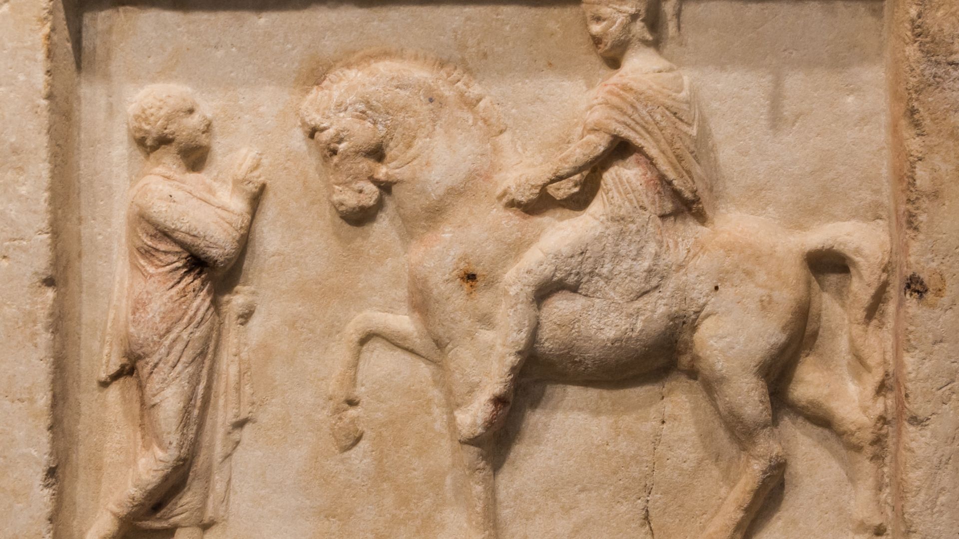 File:Marble plaque Romans discussing archmus Heraklion.jpg