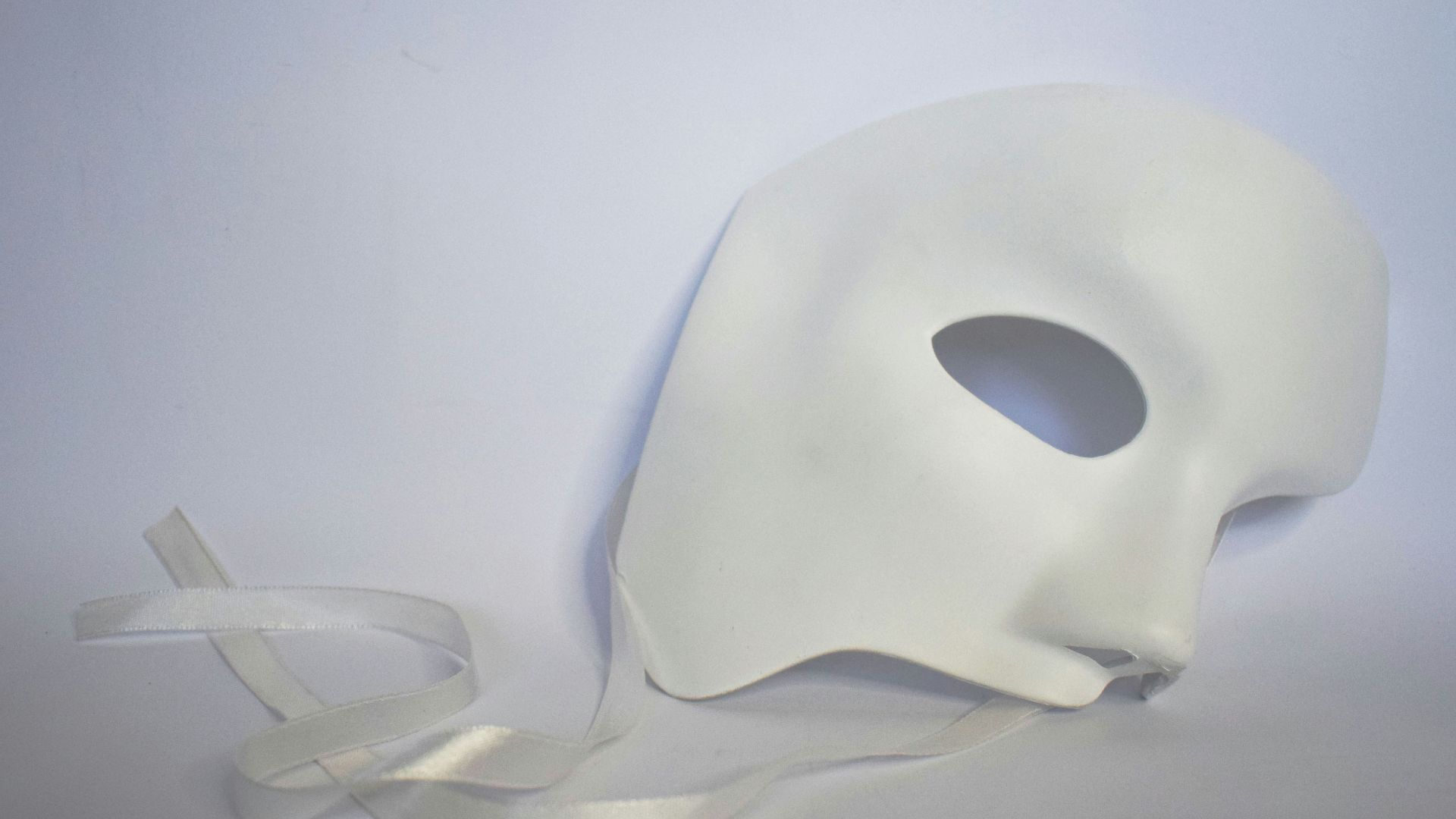 white heart shaped balloon on white surface