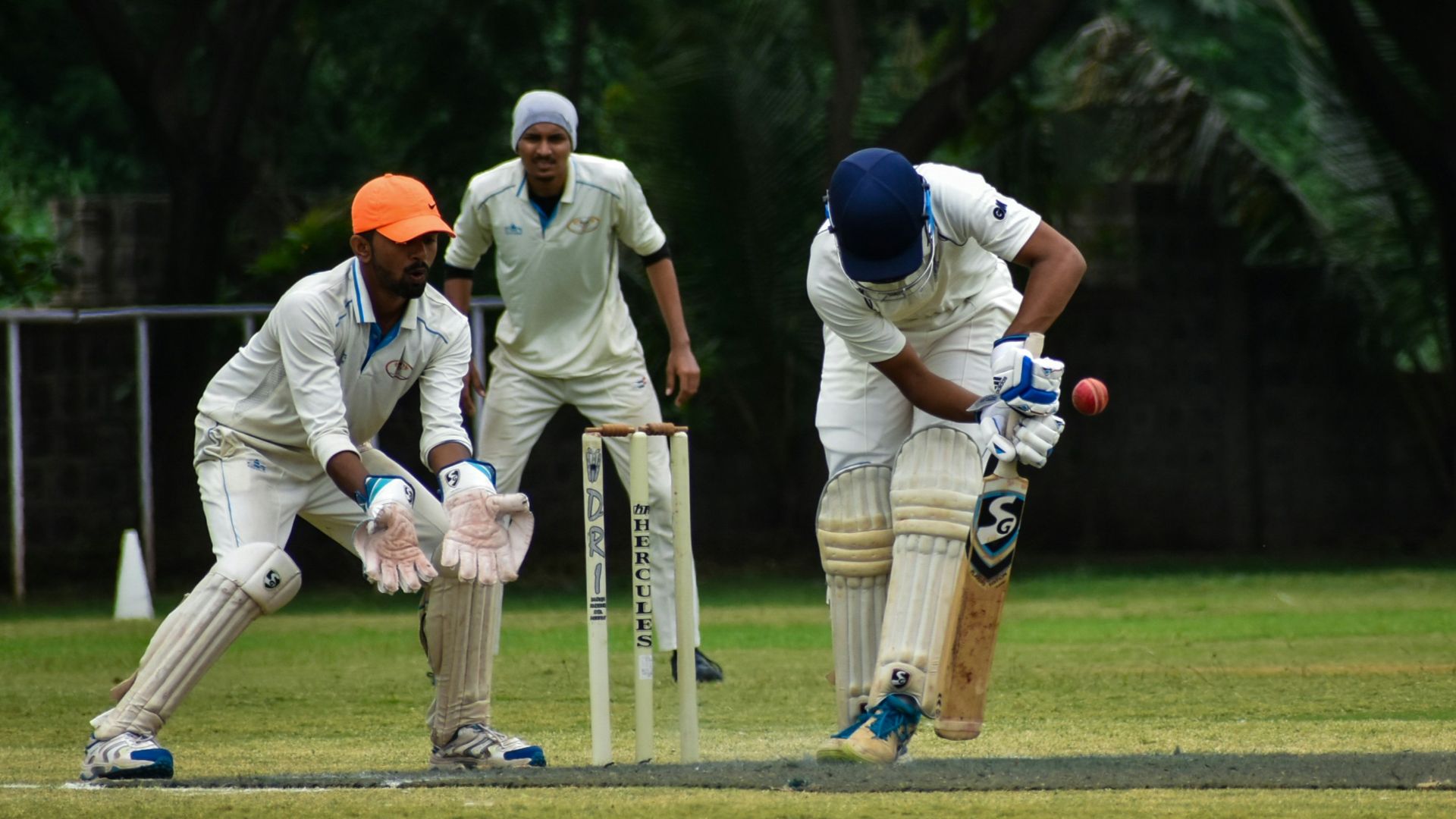 2 men playing golf during daytime