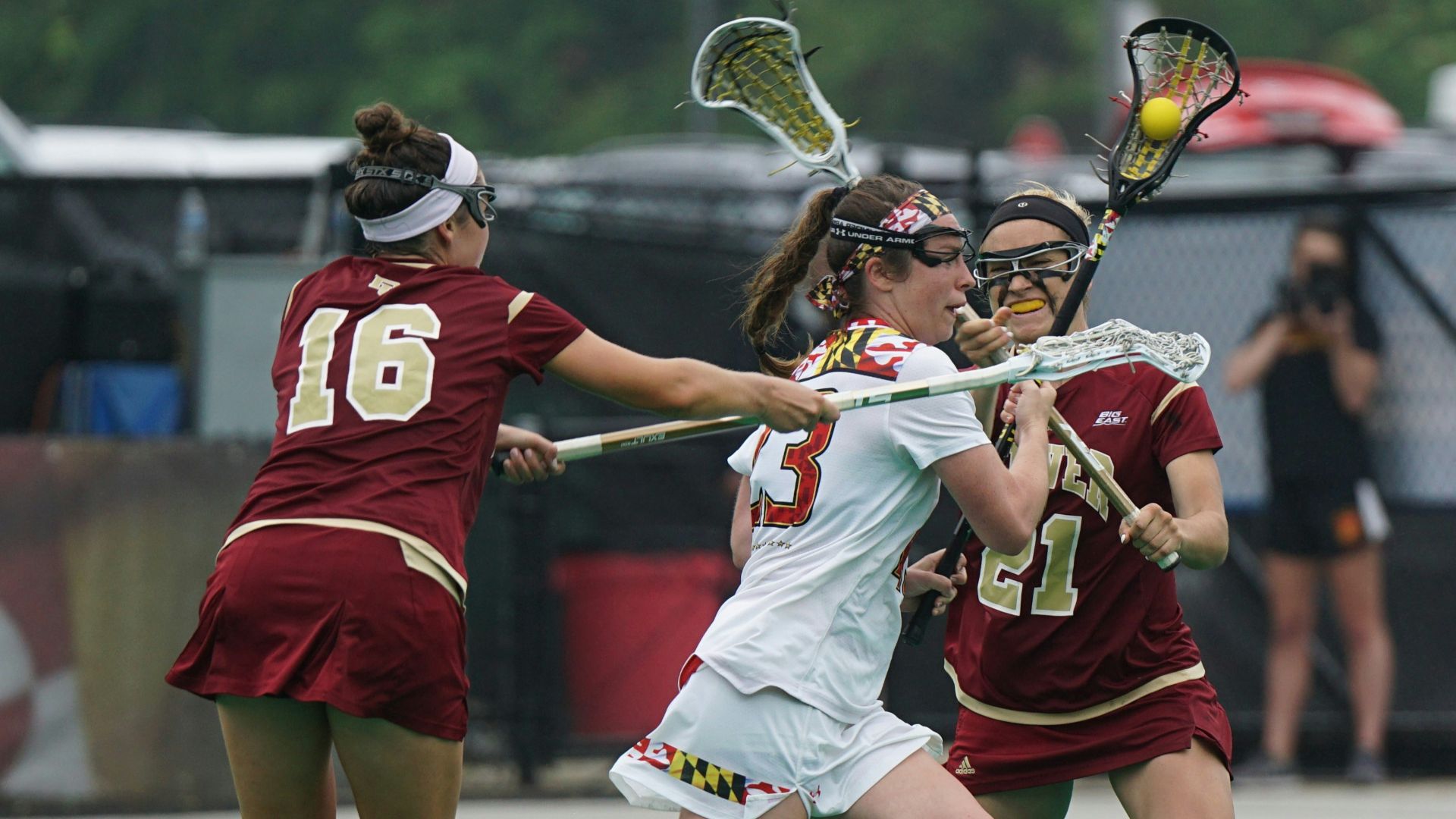 group of woman playing lacrosse