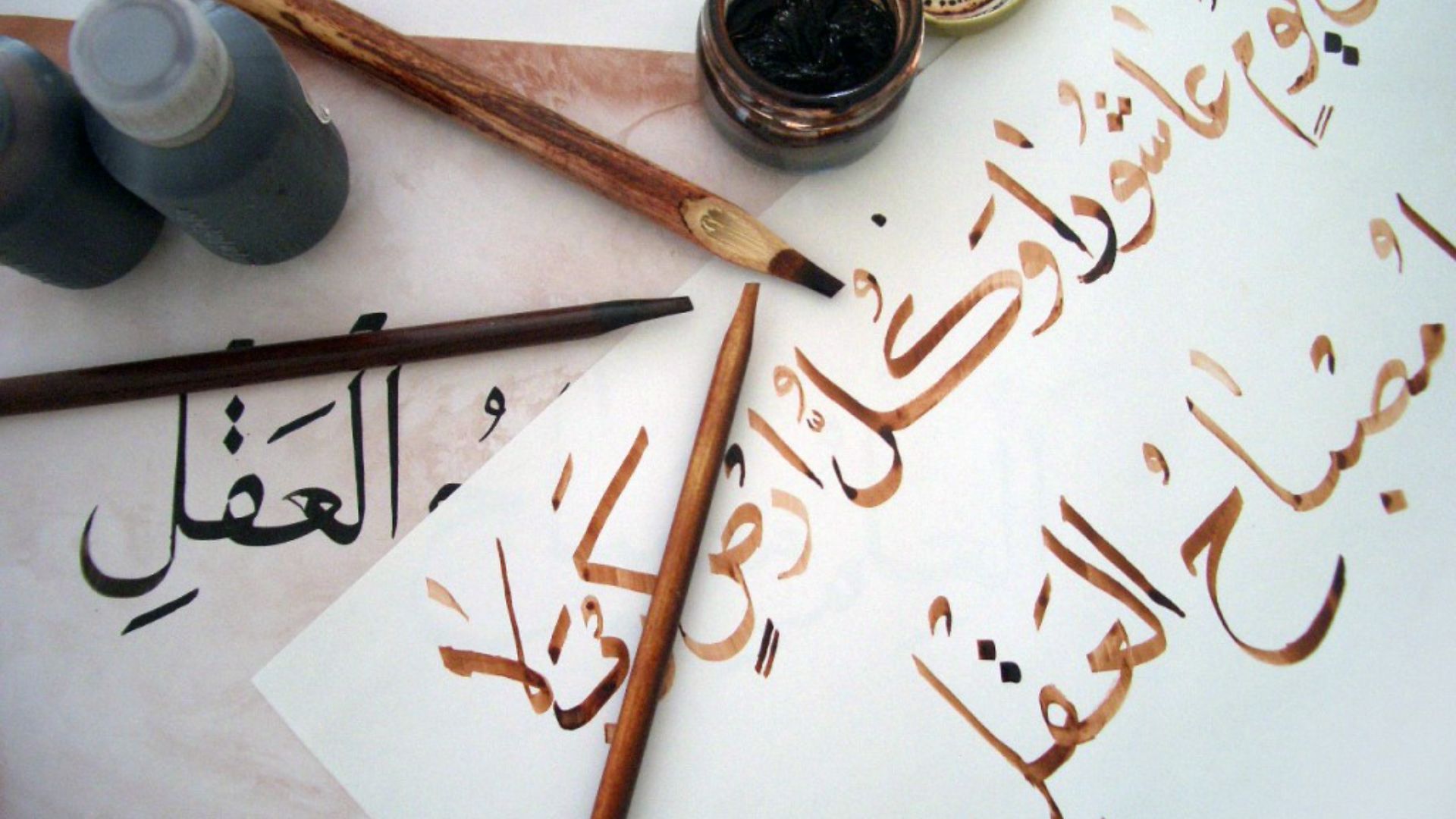 File:Learning Arabic calligraphy.jpg