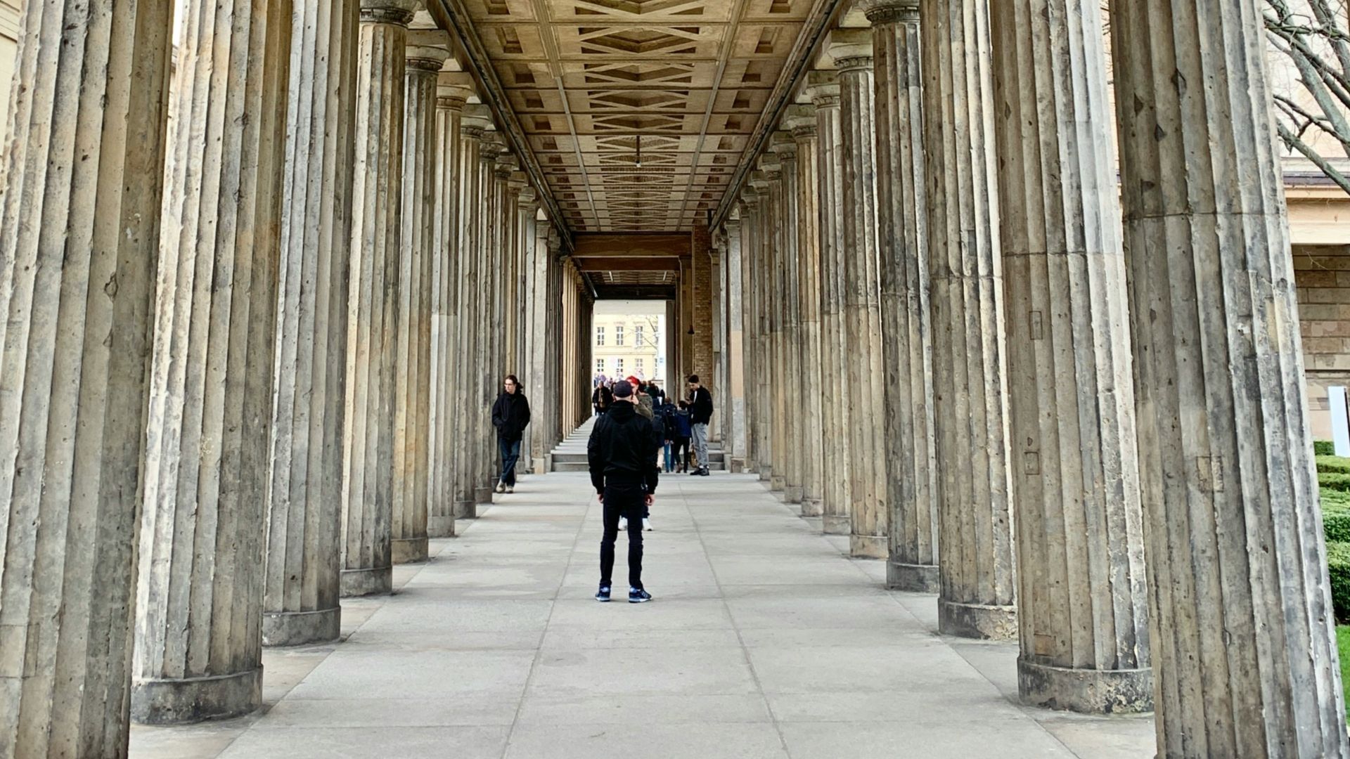 people walking on hallway during daytime