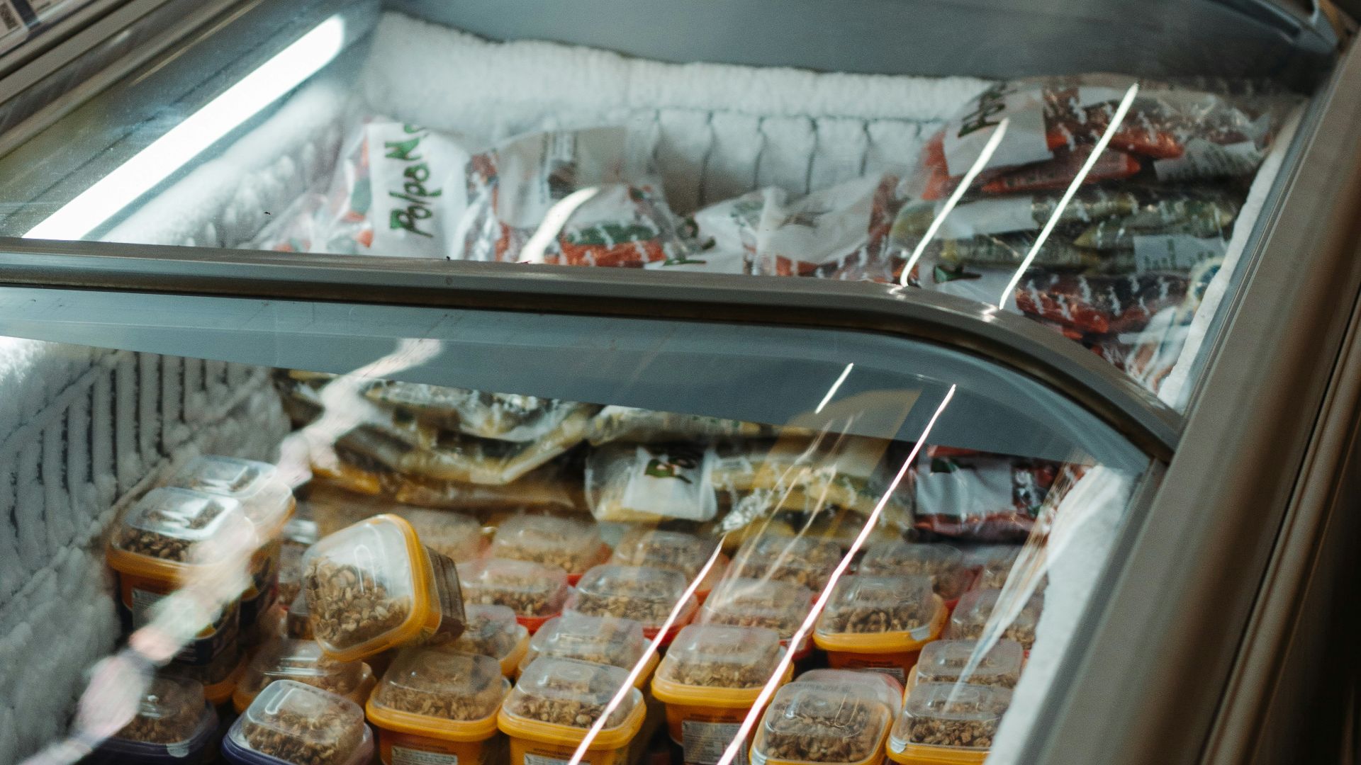 assorted food in silver commercial refrigerator