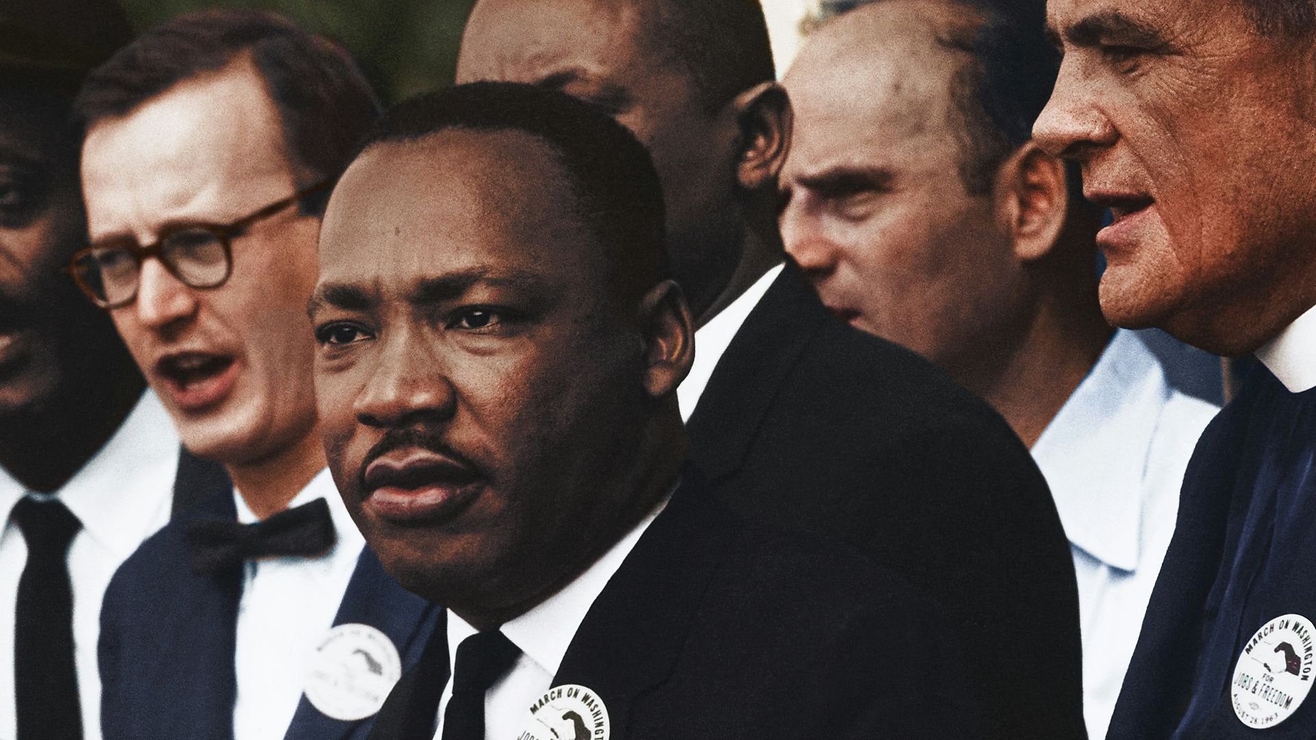 Dr. Martin Luther King, Jr. and Mathew Ahmann in a crowd of demonstrators at the March on Washington