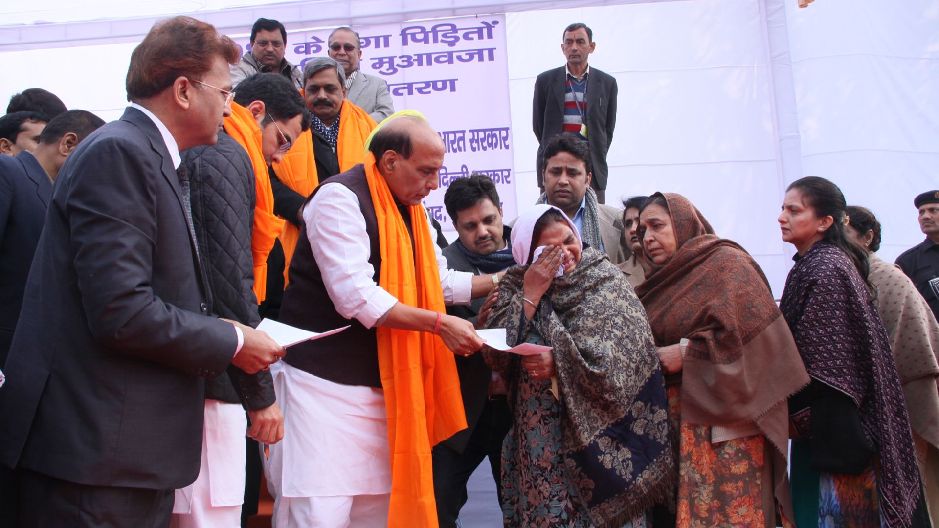 File:The Union Home Minister, Shri Rajnath Singh presented cheques for hiked compensation to 1984 anti-Sikh riot victims, at a function, in New Delhi on December 26, 2014.jpg