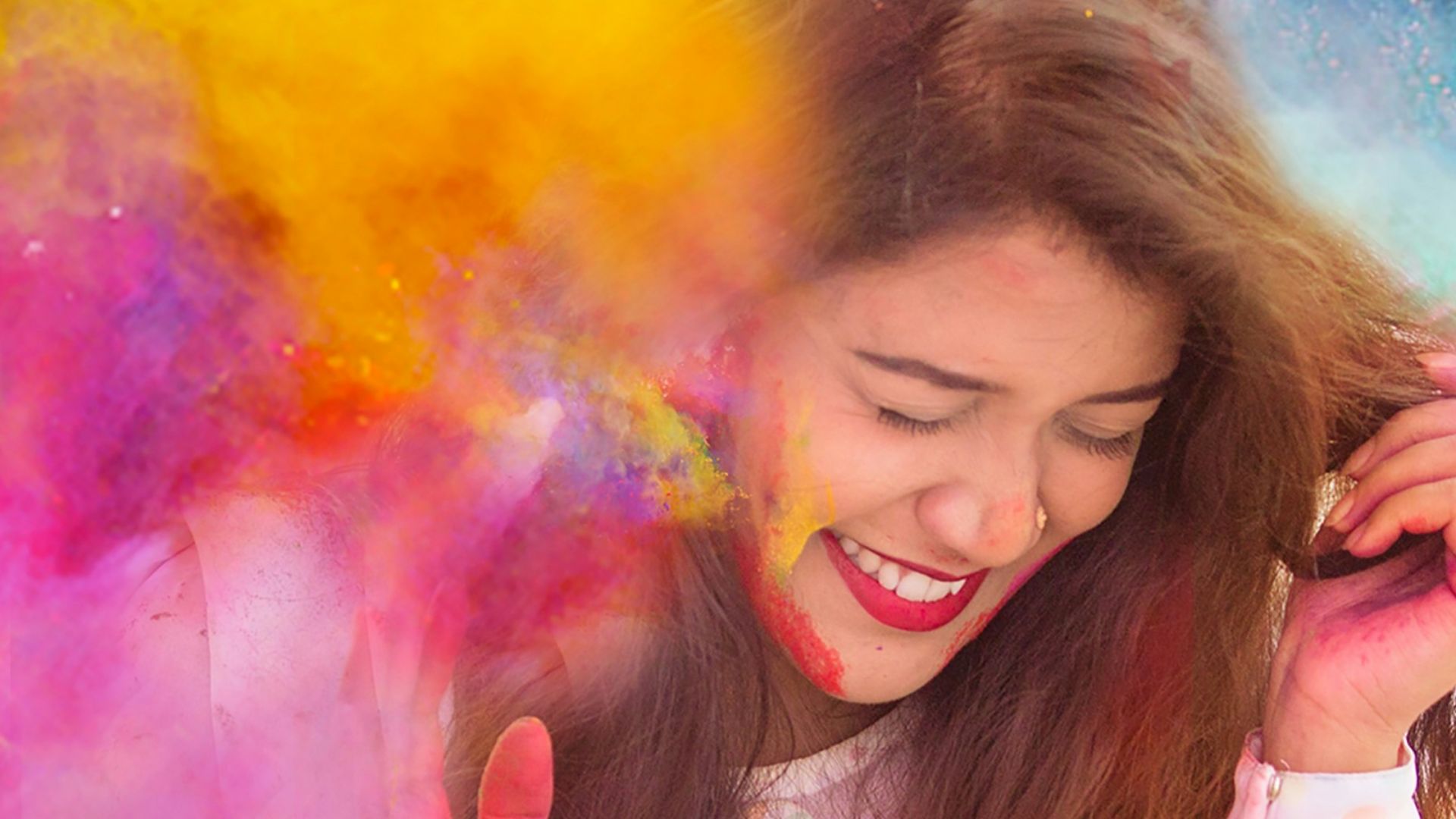 woman in white long sleeve shirt with purple yellow and blue powder on her face